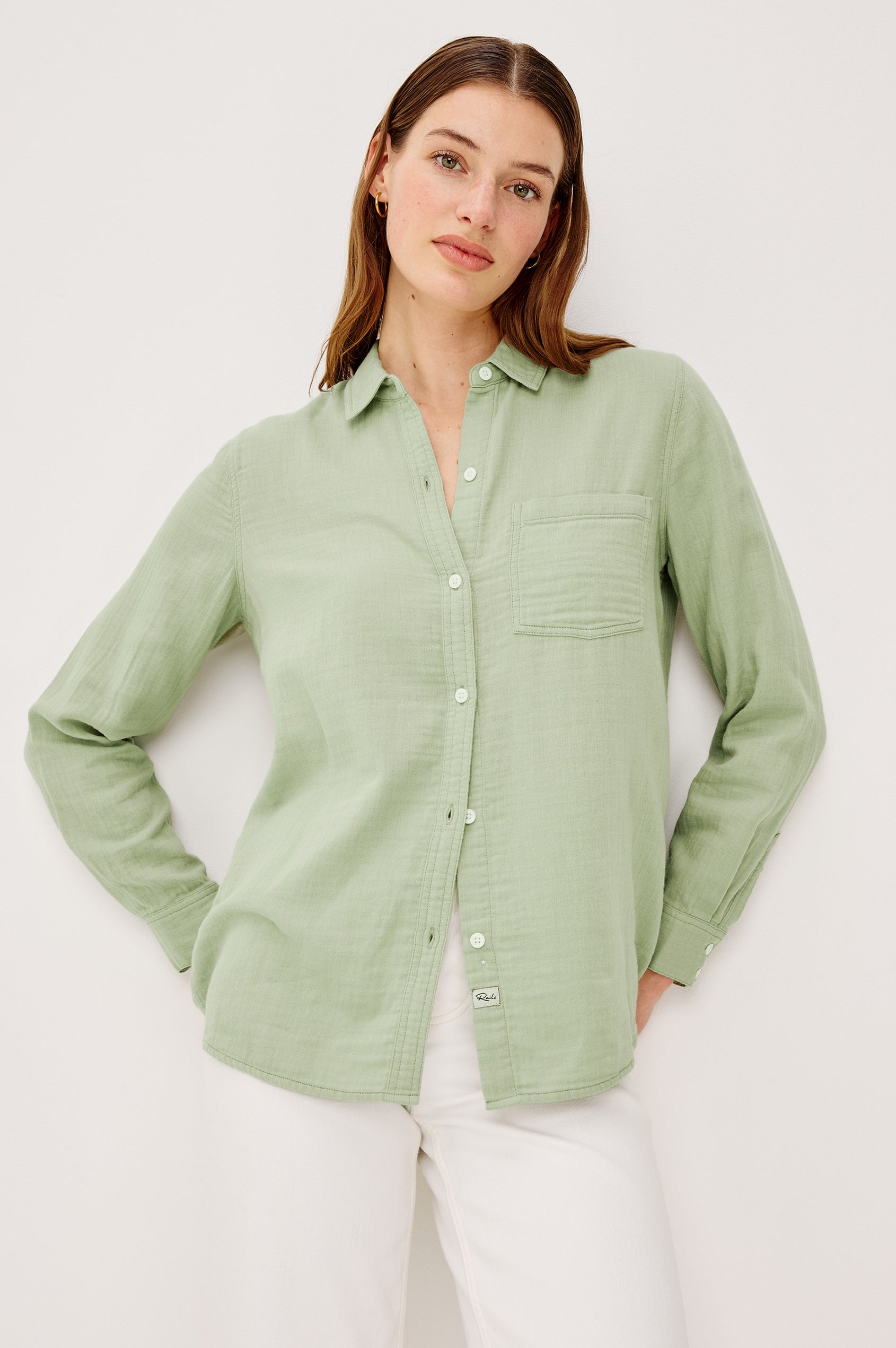 Freeman Button-Up Collared Shirt With Subtle Herringbone Texture Relaxed FIt Chest Patch Pockets and Long Sleeves in Vintage Sage Colorway - Upper Body Front View Featured on Model