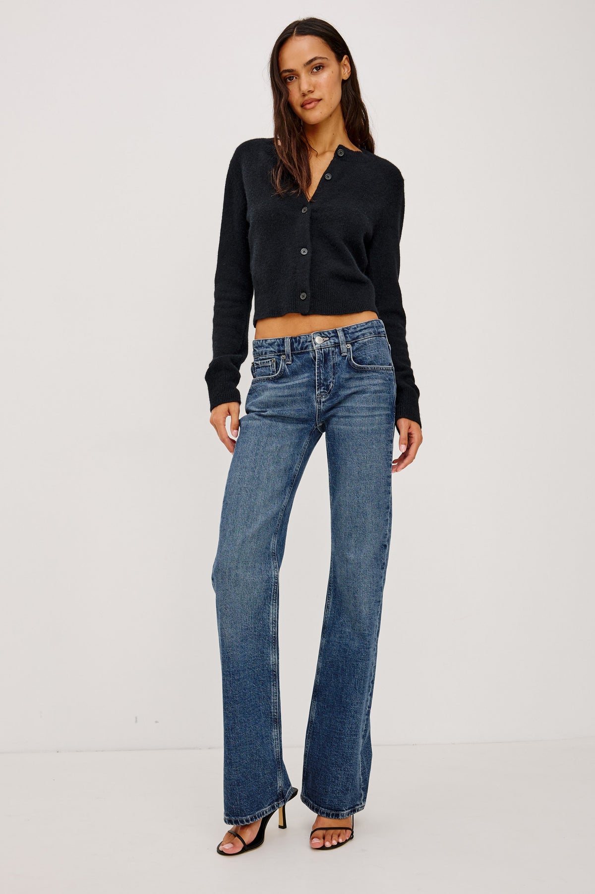 Fremont Low Rise Bootcut Jean in Light Stretch Denim With Extended Inseam, 5-Pockets, Belt Loops, and Zip-Fly Closure in Blue Haven Colorway - Full Body Front View Featured on Model.