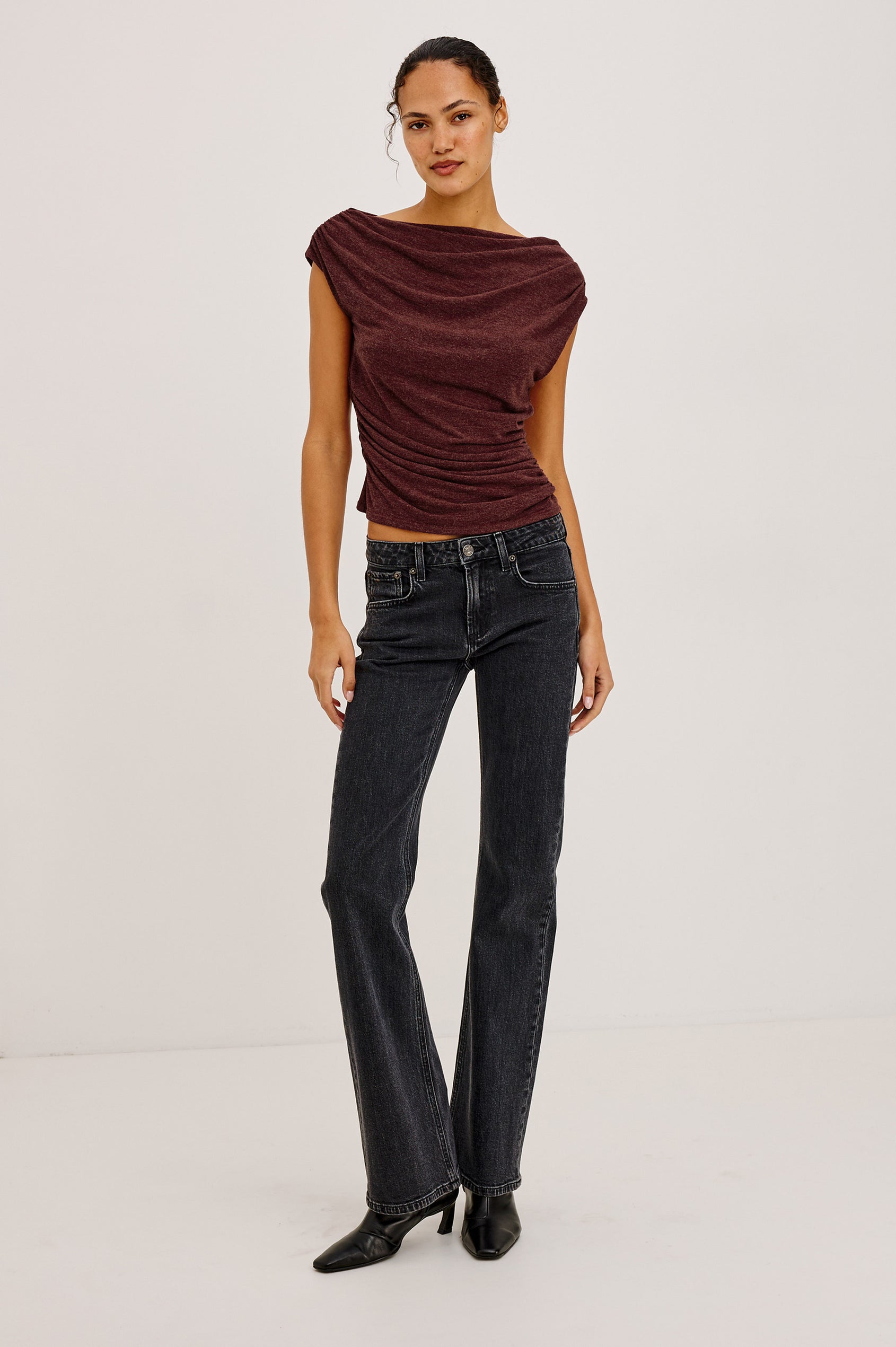 Fremont Petite Low Rise Bootcut Jean in Light Stretch Denim With Extended Inseam, 5-Pockets, Distressed Details, Belt Loops, and Zip-Fly Closure in Blackjack Colorway - Full Body Front View Featured on Model