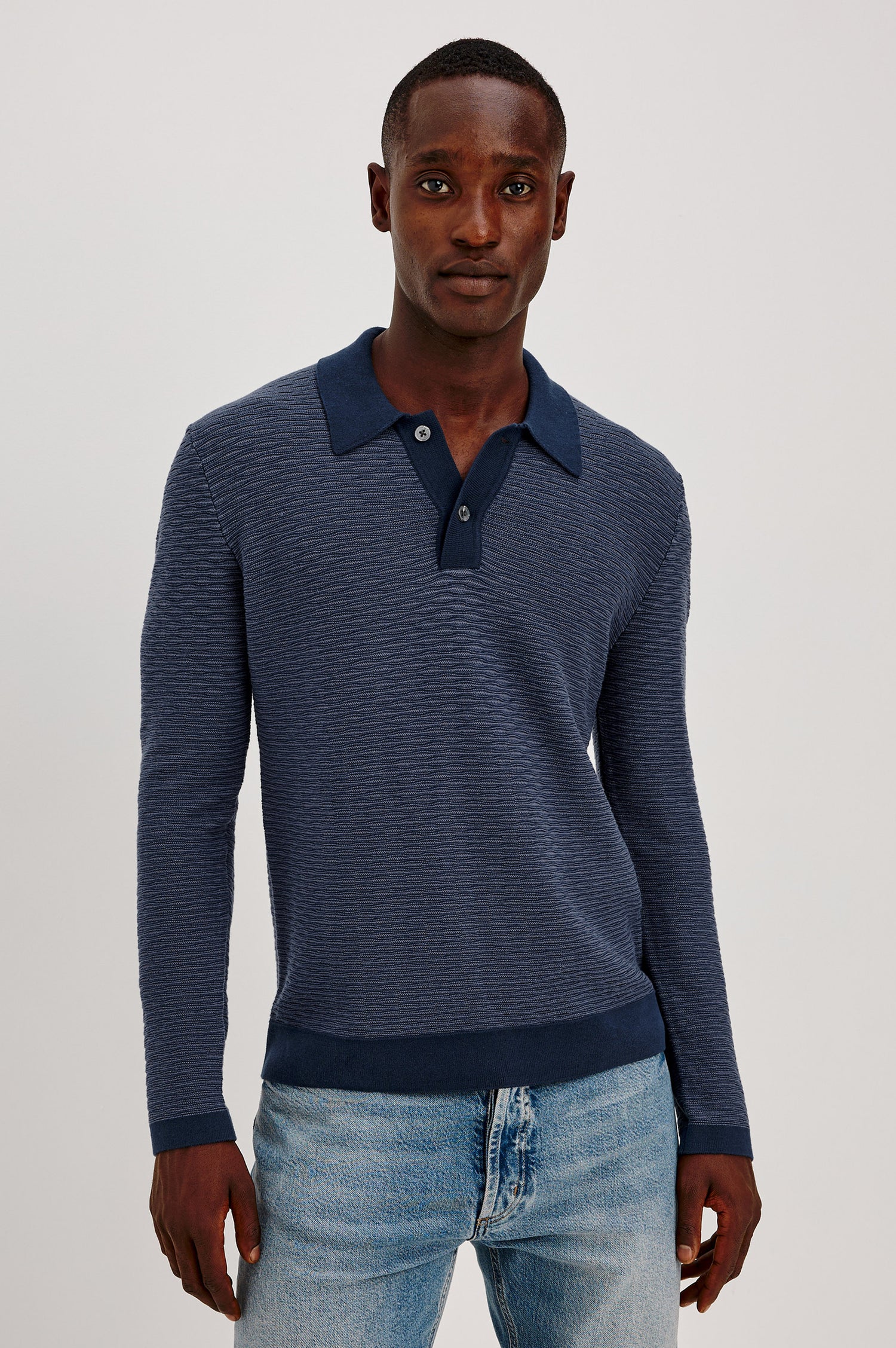Fulton Sweater in Lightweight Cotton Knit With Raglan Long Sleeves, Two-Button Placket, Collar, and Tonal Texture in Navy Wave Colorway - Upper Body Front View Featured on Model