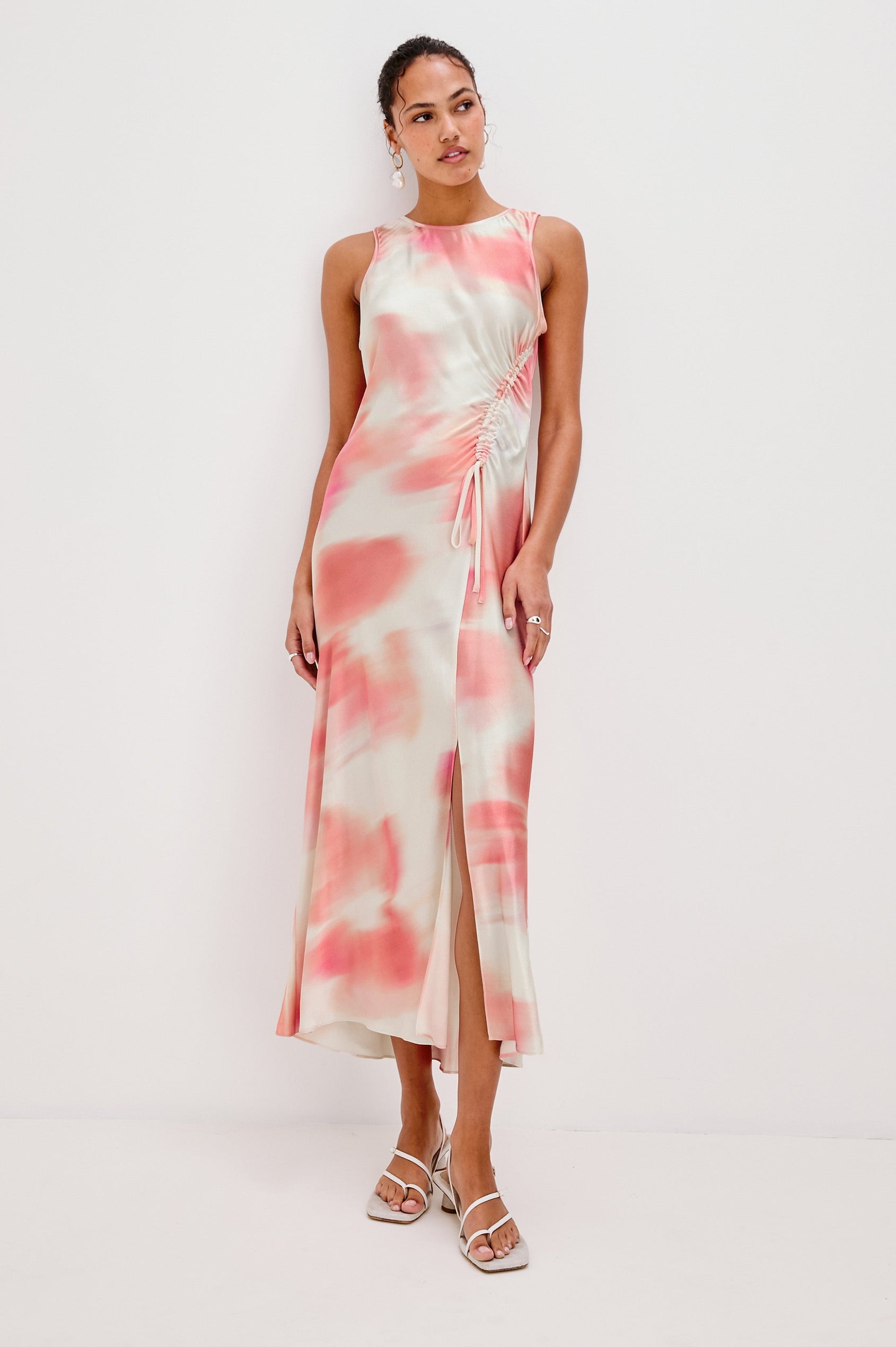 Gabriella Midi Sleeveless Dress with One Side Curved Drawstring Detail and Front Slit in Cherry Blossom Colorway. Full Body Front View Shown on Model.
