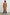 Gallery Below-the-Knee Coat with Three-Button Closure, Notched Lapels, and Two Front Flap Pockets in Camel Colorway - Back Full Body View Featured on Model