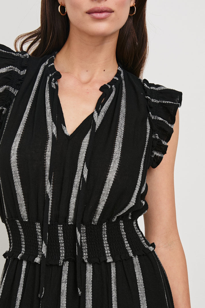 Garden Midi Dress with Flutter Cap Sleeves, Drawstrings at V-Neck and Shirred Waistband in Ash Leno Stripe Colorway, with Grey Vertical Stripes on Black - Front View Featured on Model