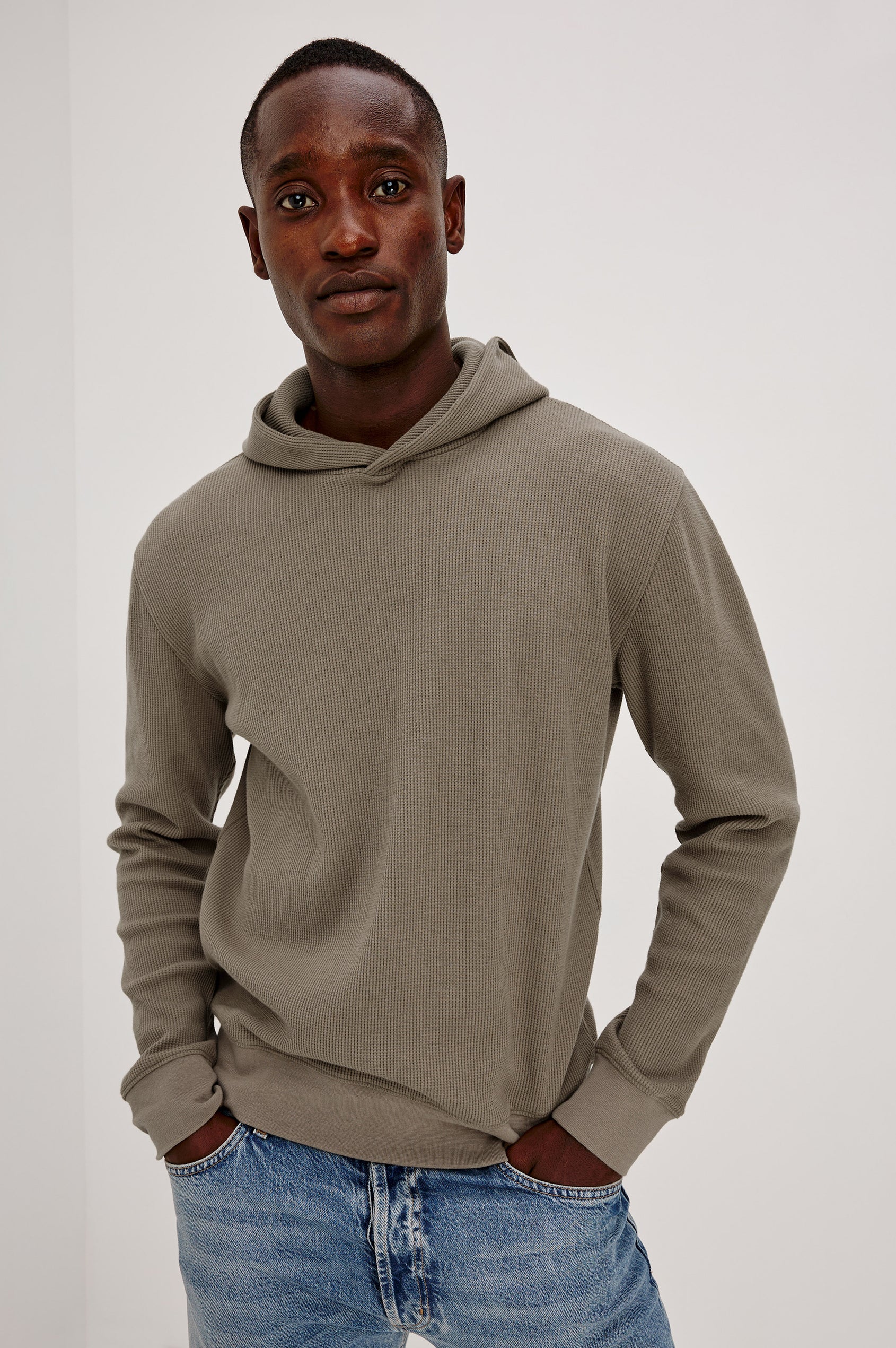 Gates Hoodie in Micro-Waffle Cotton Blend With Fixed Hood, Long Sleeves, and Relaxed Fit in Walnut Colorway - Upper Body Front View Featured on Model