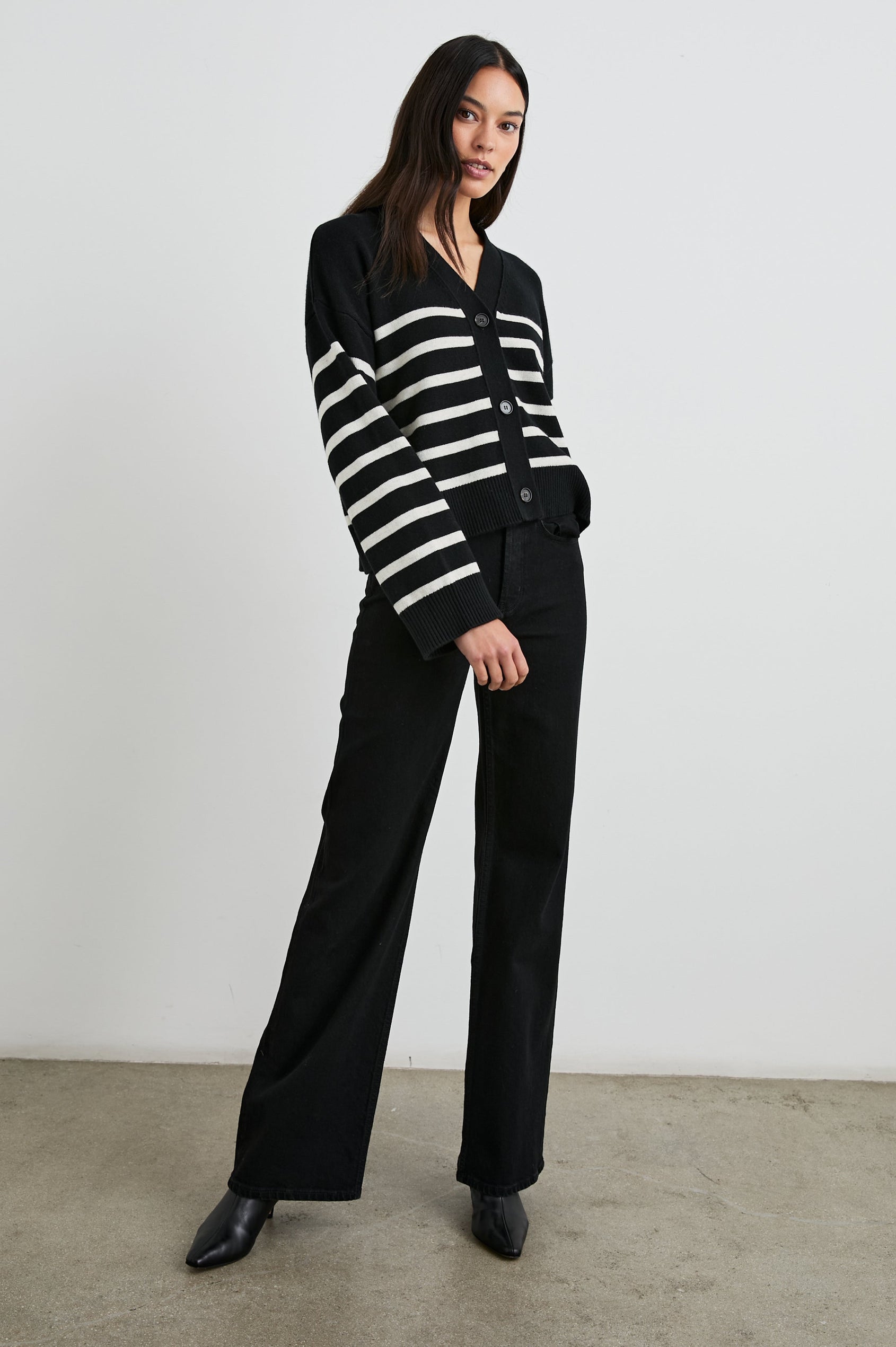 Geneva Long-Sleeve Cardigan with Button Closure and Ribbed Cuffs and Hem in Black Oatmeal Stripe Colorway - Front Full Body View Featured on Model