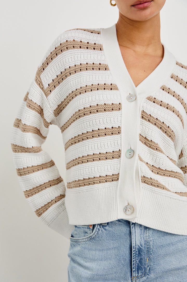 Geneva cropped cardigan sweater with front buttons and contrast trimmings in Ivory Oat Stripe - close up of details on model