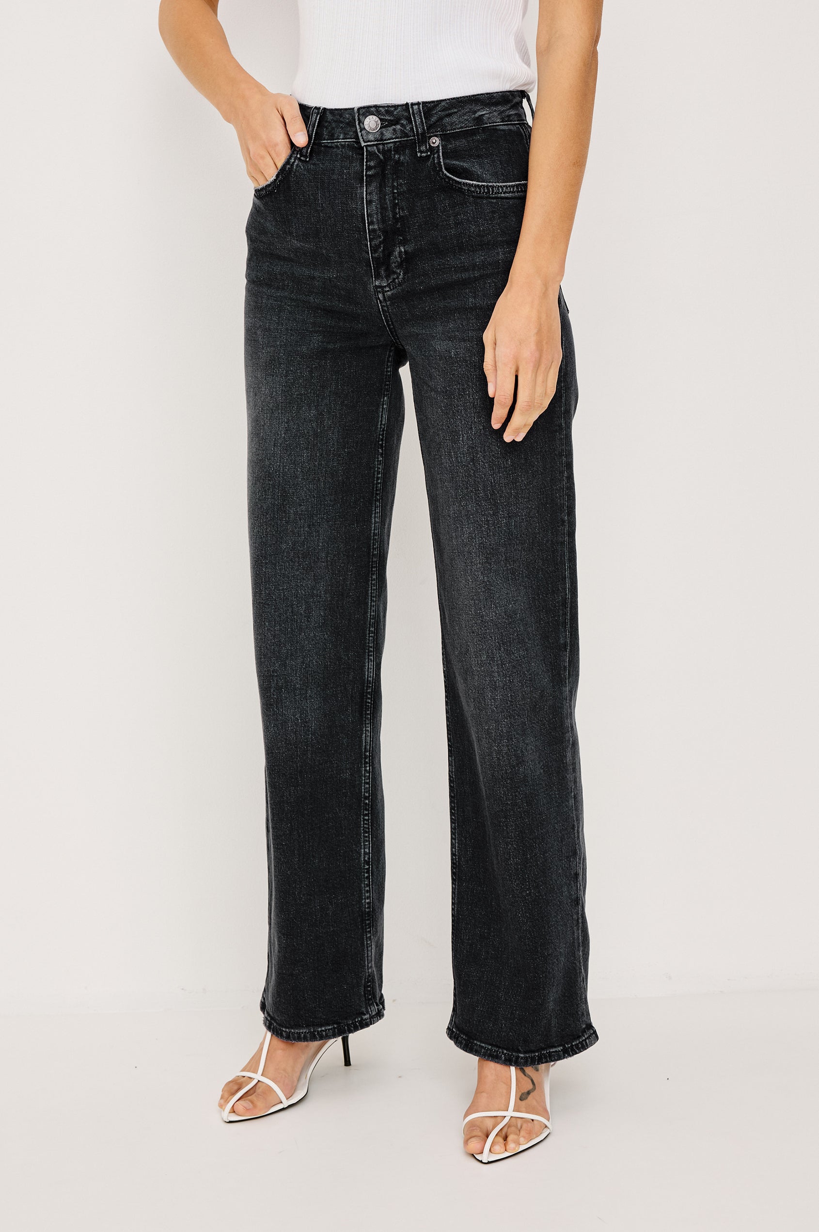 Getty Wide Leg Jean in Dark Wash Denim With High-Rise High-Waisted Fit, Front Button Fly, 5-Pocket Styling in Black Pearl Colorway - Lower Body Front View Featured on Model