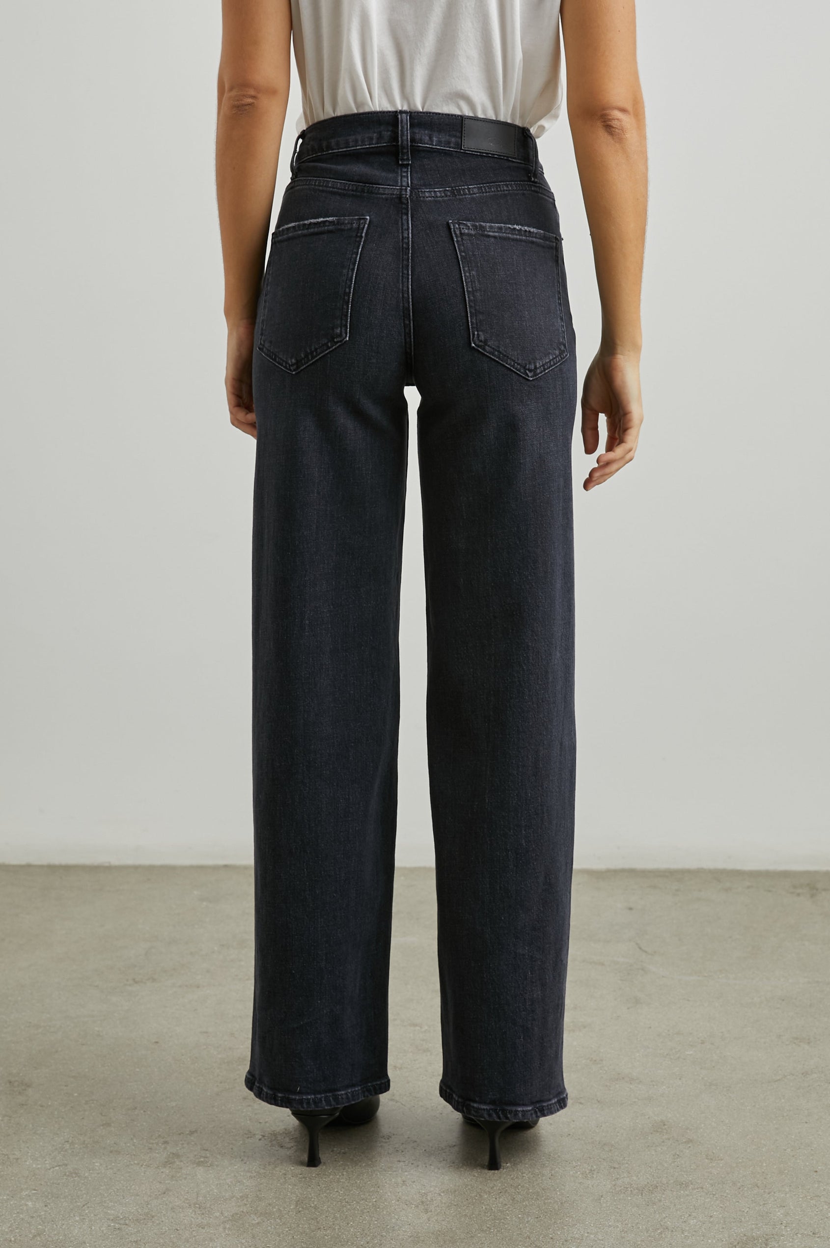 Getty Wide Leg Denim Pants with Belt Loops, Two Front Pockets and Two Back Patch Pockets in Black Pearl Colorway - Back View Featured on Model