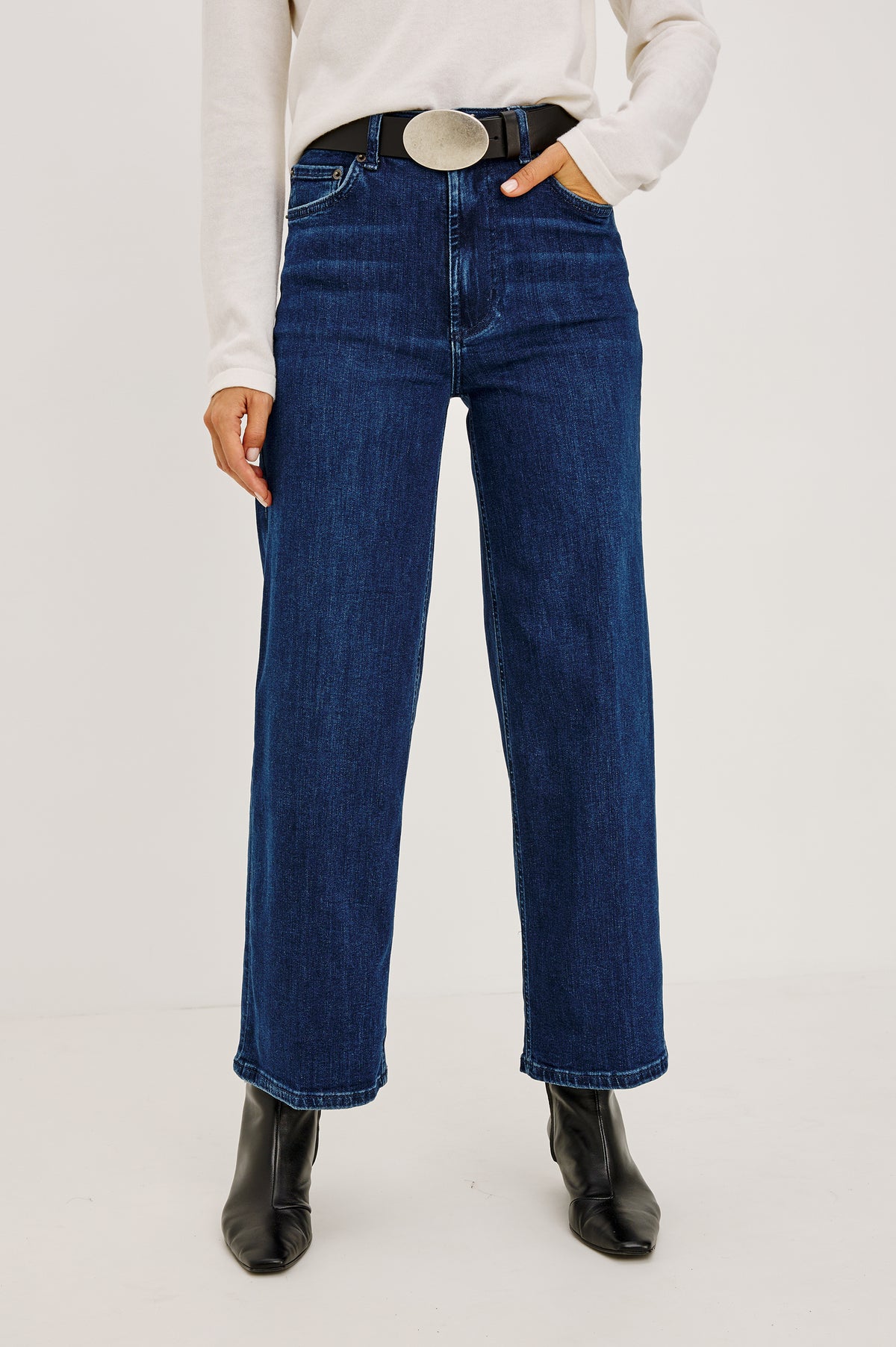 Getty Crop Wide Leg Jean in Light Stretch Denim With High-Rise High-Waisted Fit, Button Fly, and 5-Pockets in After Midnight Colorway - Upper Body Front View Featured on Model.