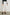 Getty Crop Wide Leg Denim Pants with Belt Loops, Two Front Pockets and Two Back Patch Pockets in Ecru Patchwork Colorway, with large patches in shades of white - Front View Featured on Model