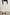 Getty Crop Wide Leg Denim Pants with Belt Loops, Two Front Pockets and Two Back Patch Pockets in Ecru Patchwork Colorway, with large patches in shades of white - Back View Featured on Model