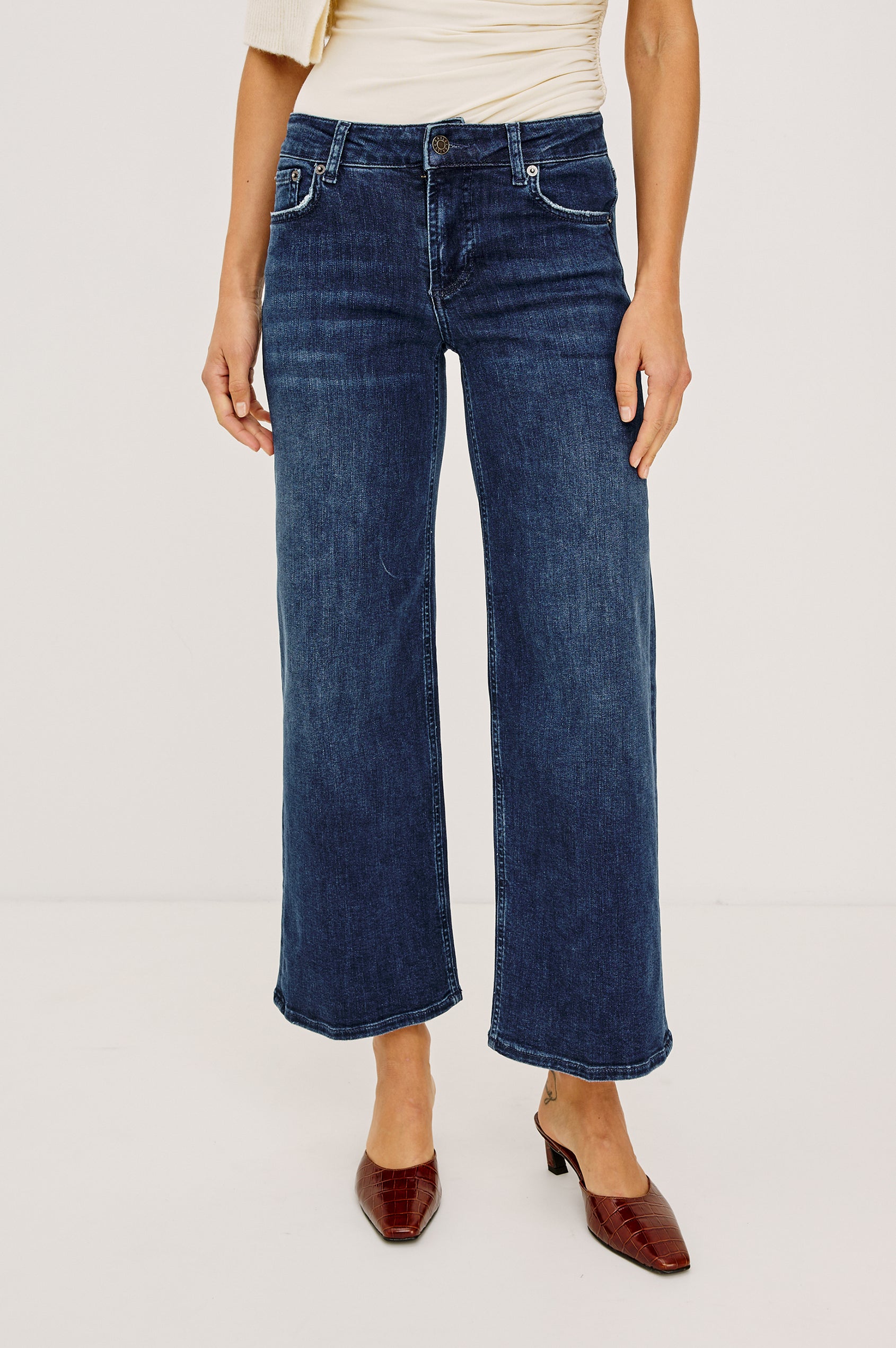 Getty Crop Low Rise Jean in Light Stretch Denim With Wide Legs and 5-Pockets in After Midnight Colorway - Lower Body Front View Featured on Model