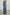 Getty Wide Leg Denim Pants with Belt Loops, Two Front Pockets and Two Back Patch Pockets in East Coast Colorway - Side View Featured on Model