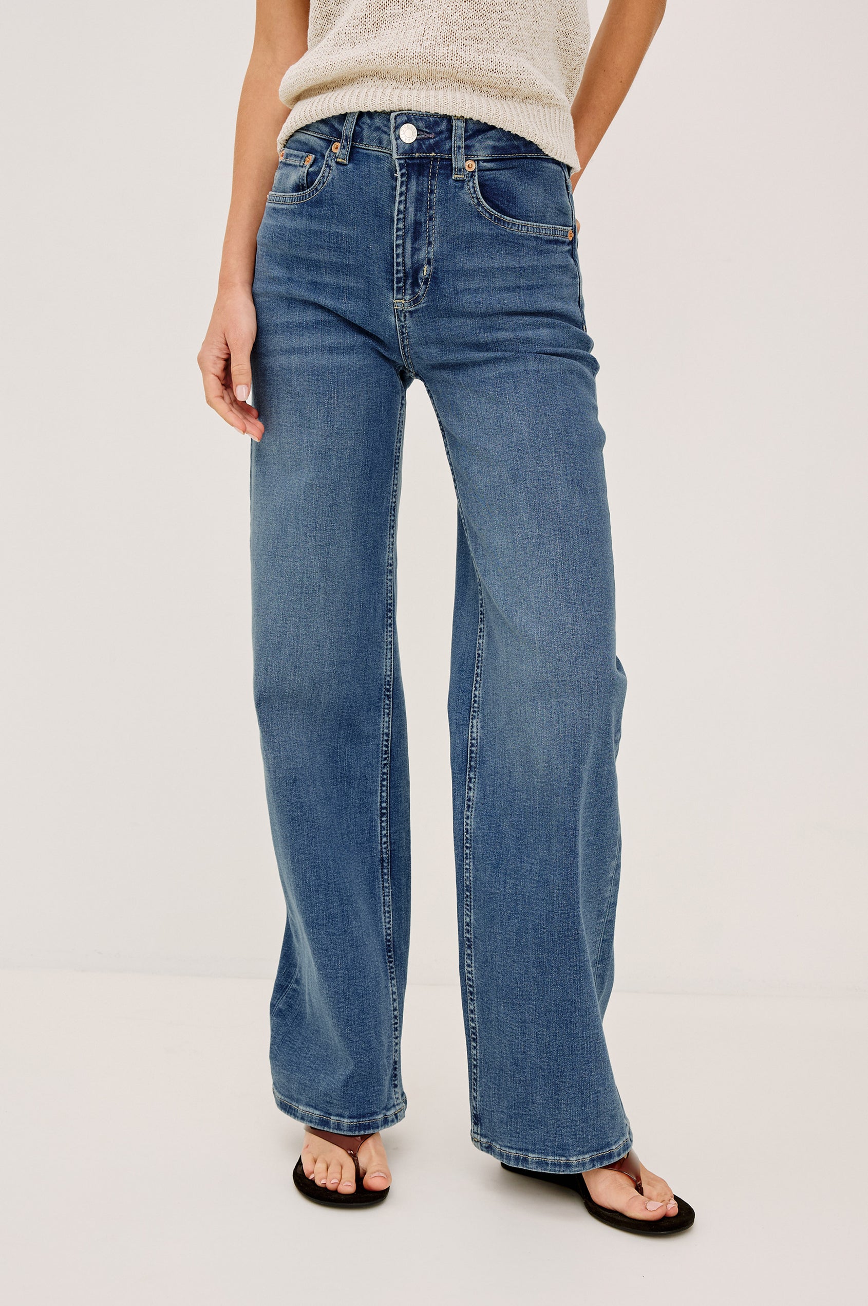 Getty Petite Wide Leg Denim Pants with Belt Loops, Two Front Pockets and Two Back Patch Pockets in East Coast Colorway - Front View Featured on Model