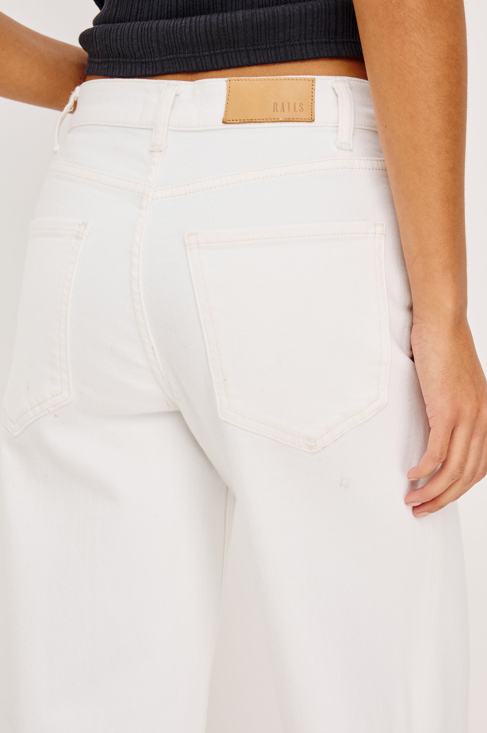 Getty Petite Wide Leg Jean in Light Stretch Denim With High Rise, 5-Pockets, and Button Fly in Vintage Ecru - Lower Body Back View Featured on Model
