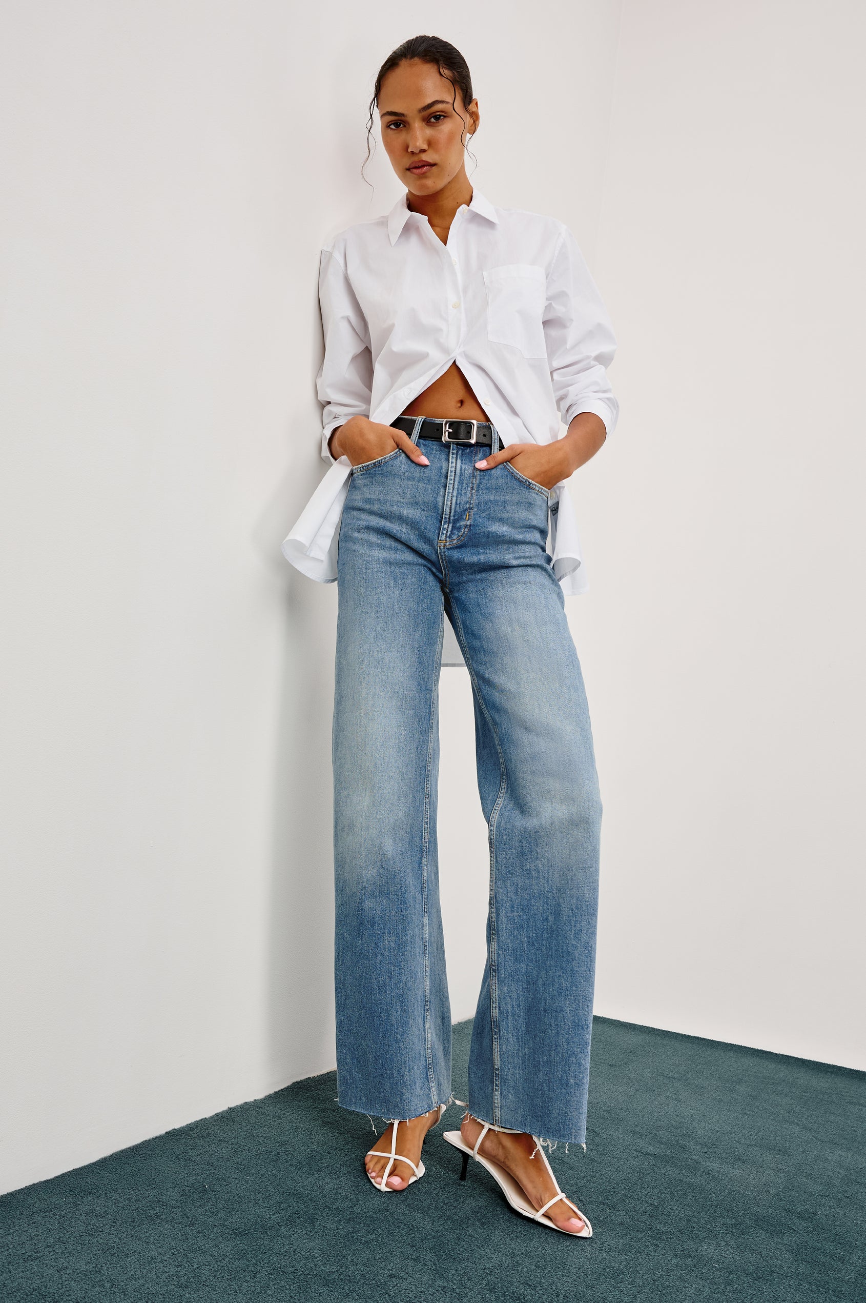 Getty full length 5-pocket wide leg jean in Tradewind colorway, a medium wash. Front full body view featured on model.