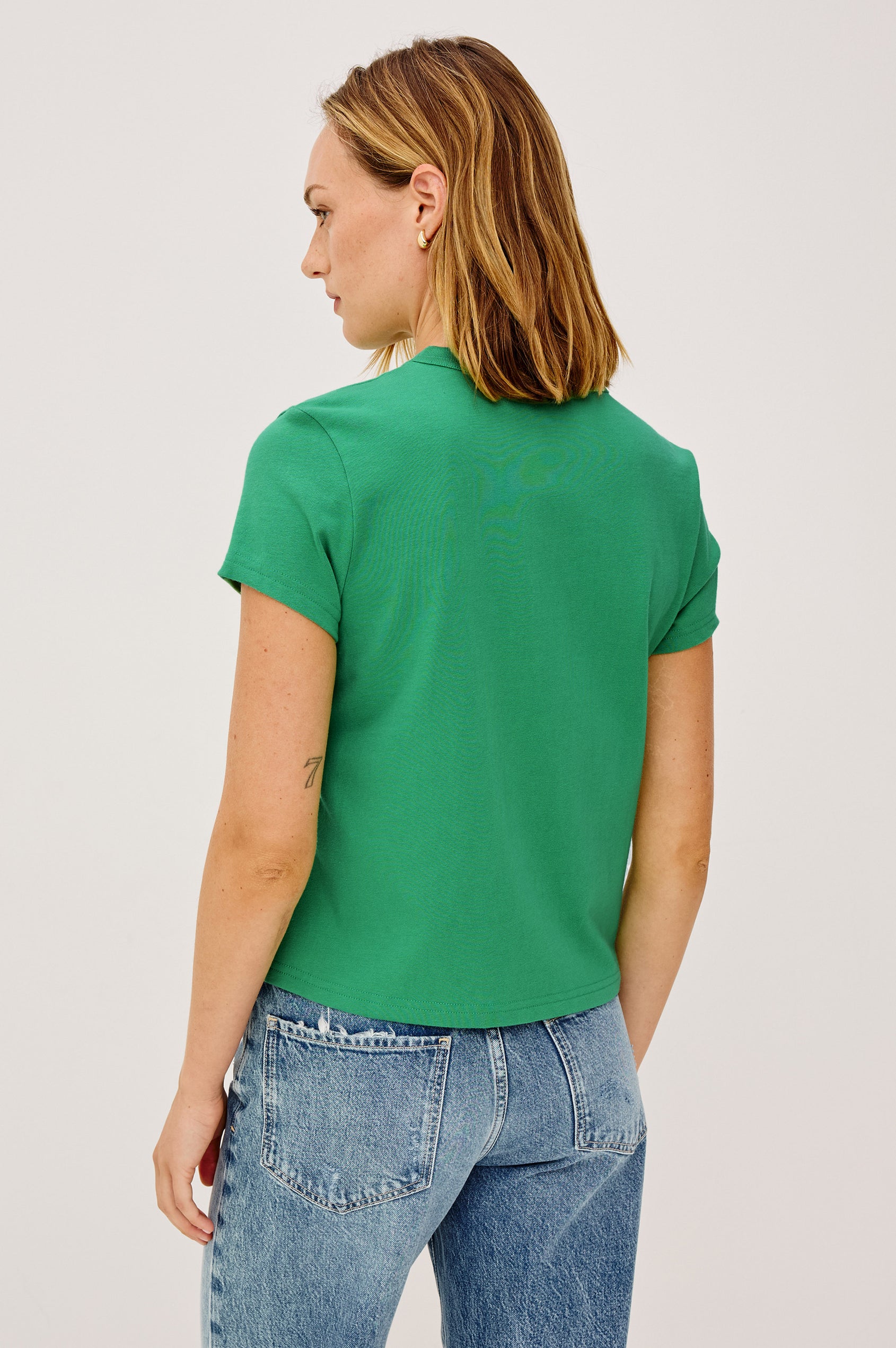 Girlfriend T-Shirt in 100% Cotton With Slightly Boxy Cropped Fit, Crew Neckline, and Short Sleeves in Clover Colorway - Upper Body Back View Featured on Model