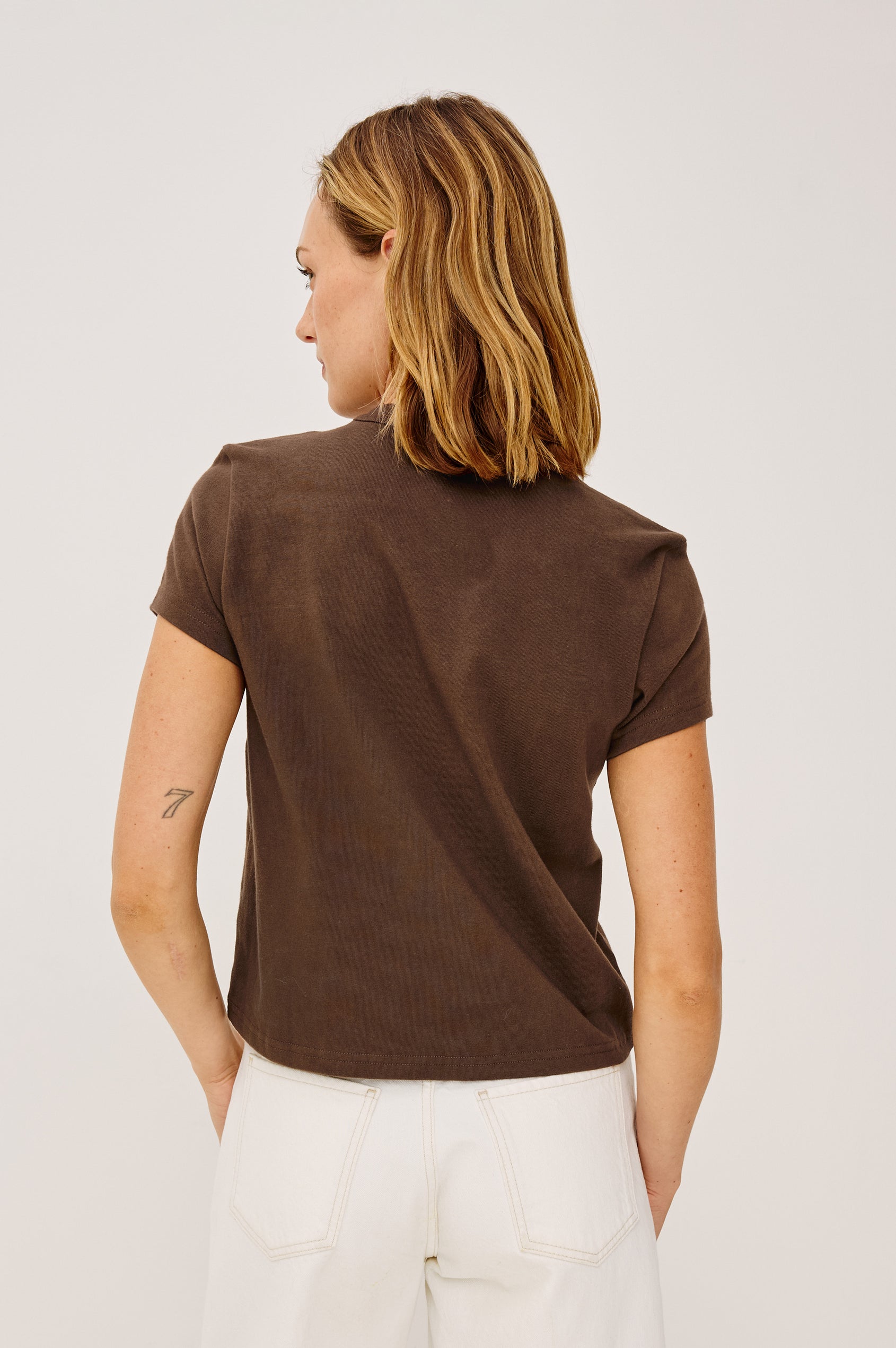 Girlfriend T-Shirt in 100% Cotton With Slightly Boxy Cropped Fit, Crew Neckline, and Short Sleeves in Espresso Colorway - Upper Body Back View Featured on Model