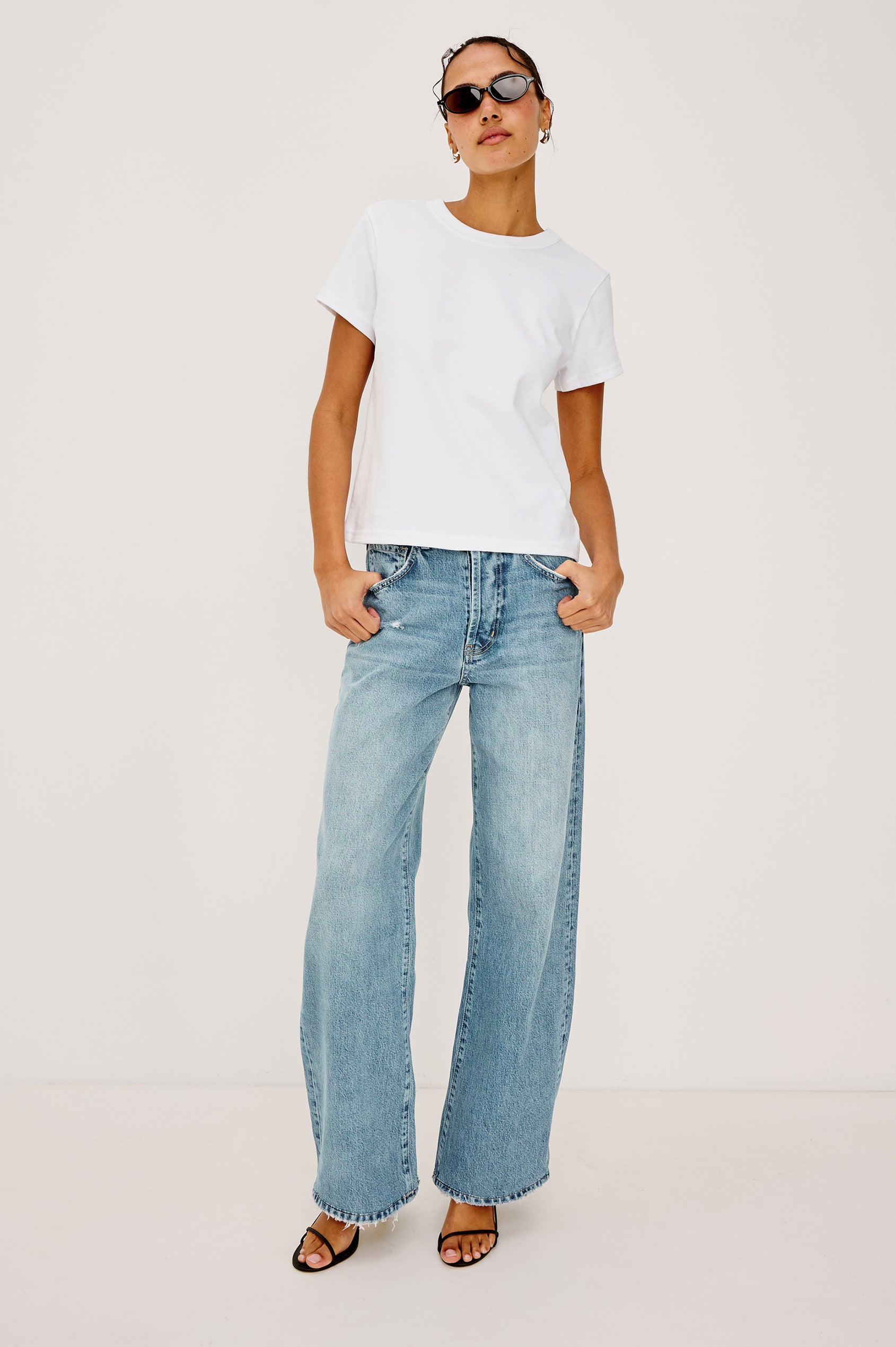 Girlfriend T-Shirt in Pleated Jersey With Slightly Boxy, Cropped Silhouette in White Colorway - Full Body Front View Featured on Model