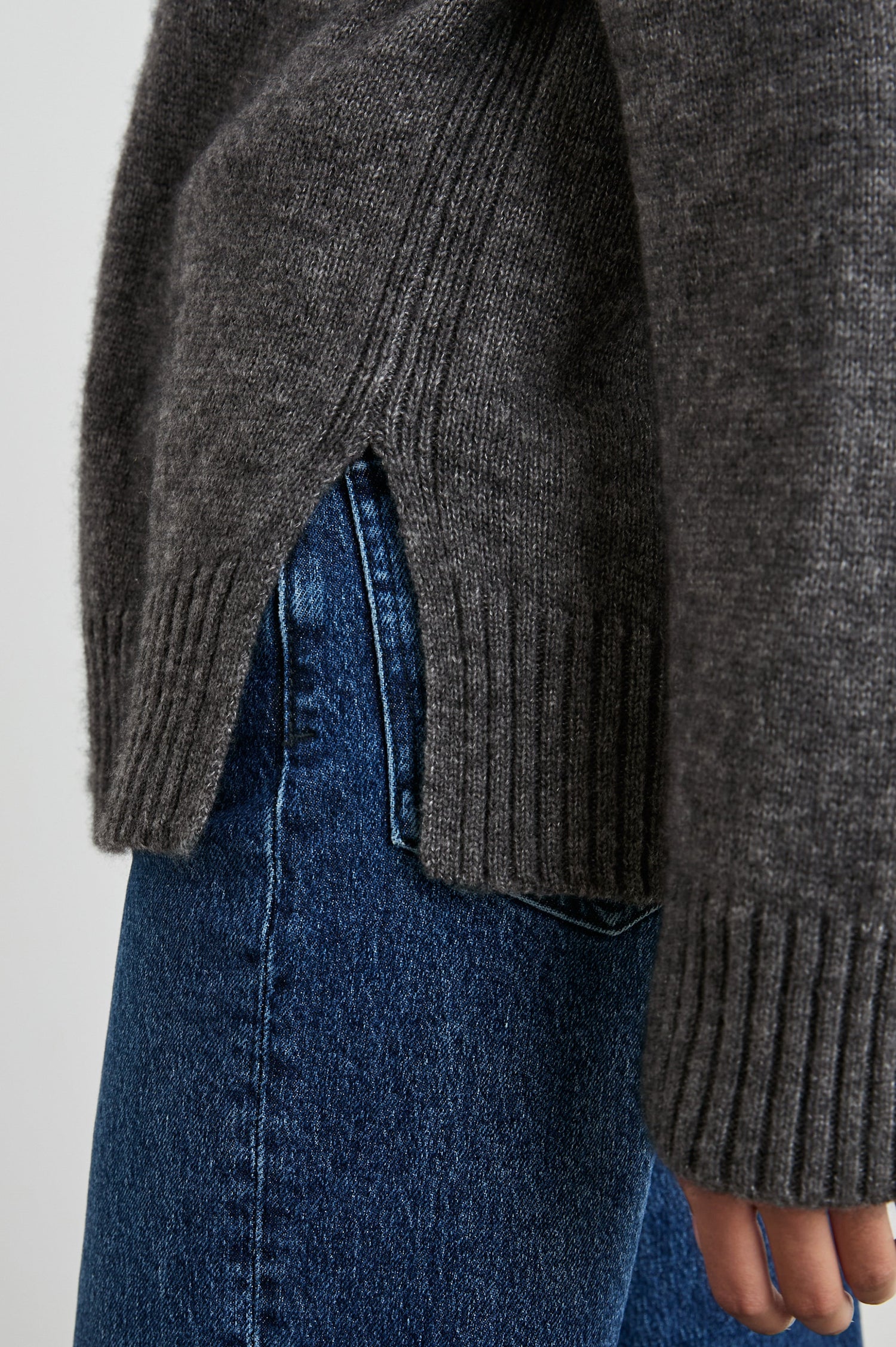 Gisella Long-Sleeve V Neck Sweater with Ribbed Trim and Side Slits in Thunder Colorway - Side View Featured on Model