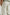 Gobi Pants with Drawstring Waist, Two Large Front Pockets and Two Back Buttoned Patch Pockets in Natural Colorway - Back View Featured on Model