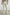 Gobi Pants with Drawstring Waist, Two Large Front Pockets and Two Back Buttoned Patch Pockets in Natural Colorway - Back View Featured on Model