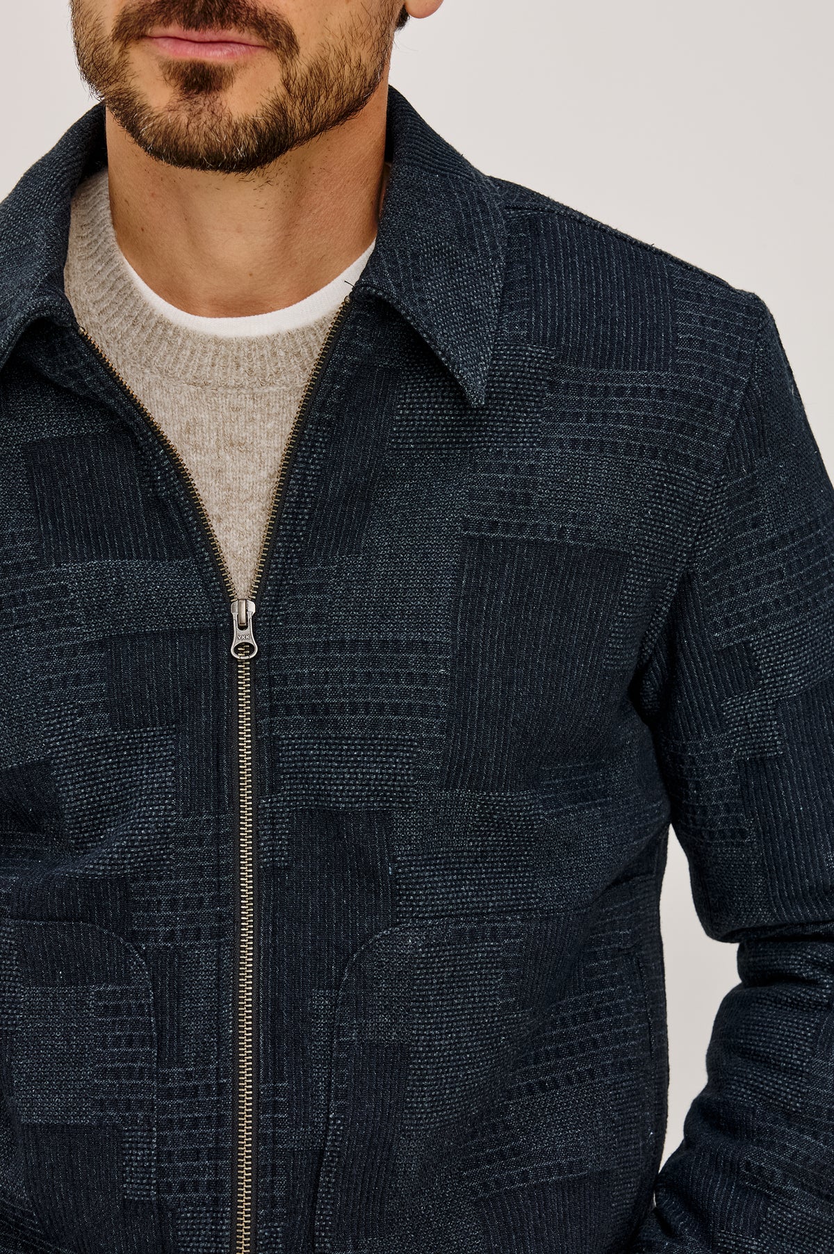 Hawthorne Jacket in Patchwork Textured Knit With Front Zip Closure, Point Collar, and Long Sleeves in Shadow Eve Colorway - Upper Body Front Detail View Featured on Model.