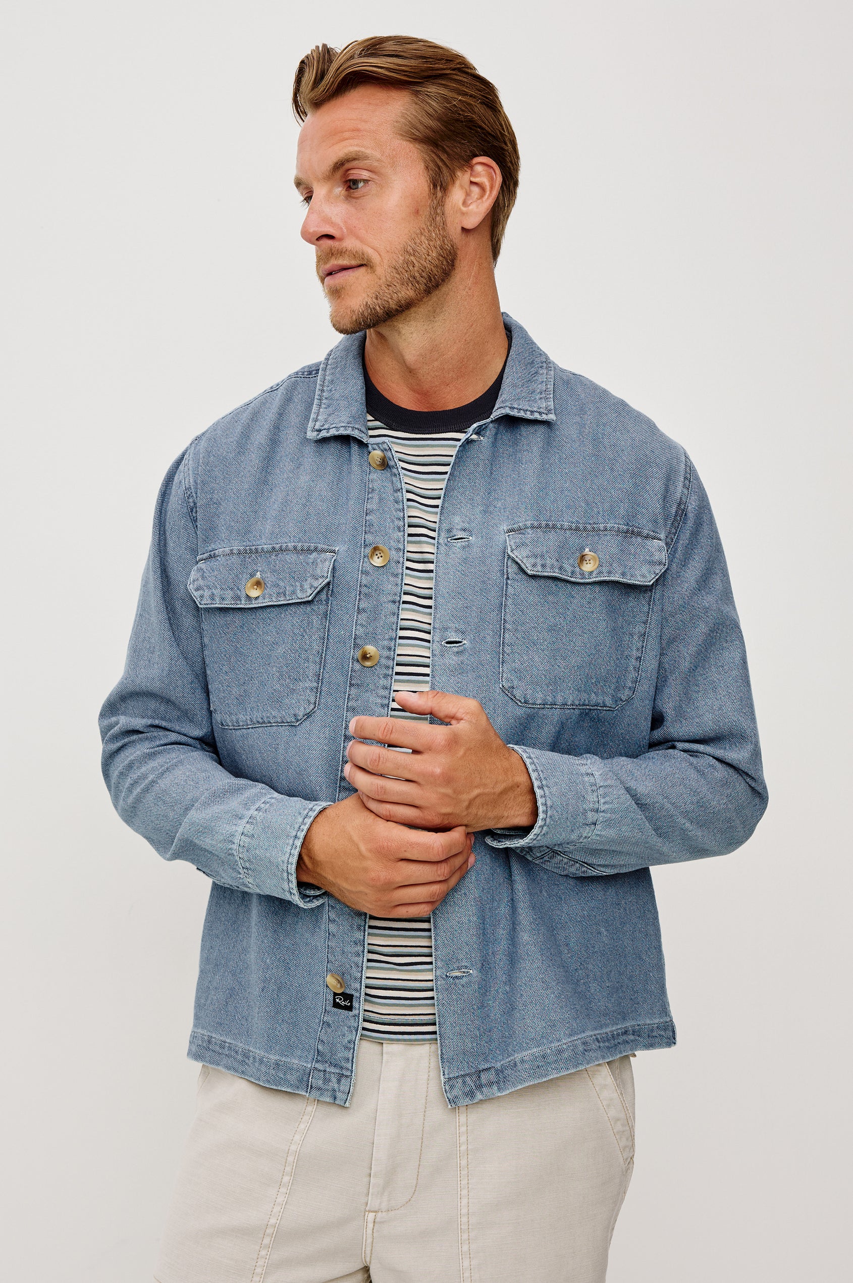 Hayes Shirt Jacket in Linen Cotton Slub With Long Sleeves, Chest Patch Pockets, and Collar in Medium Wash Indigo Colorway - Upper Body Front View Featured on Model