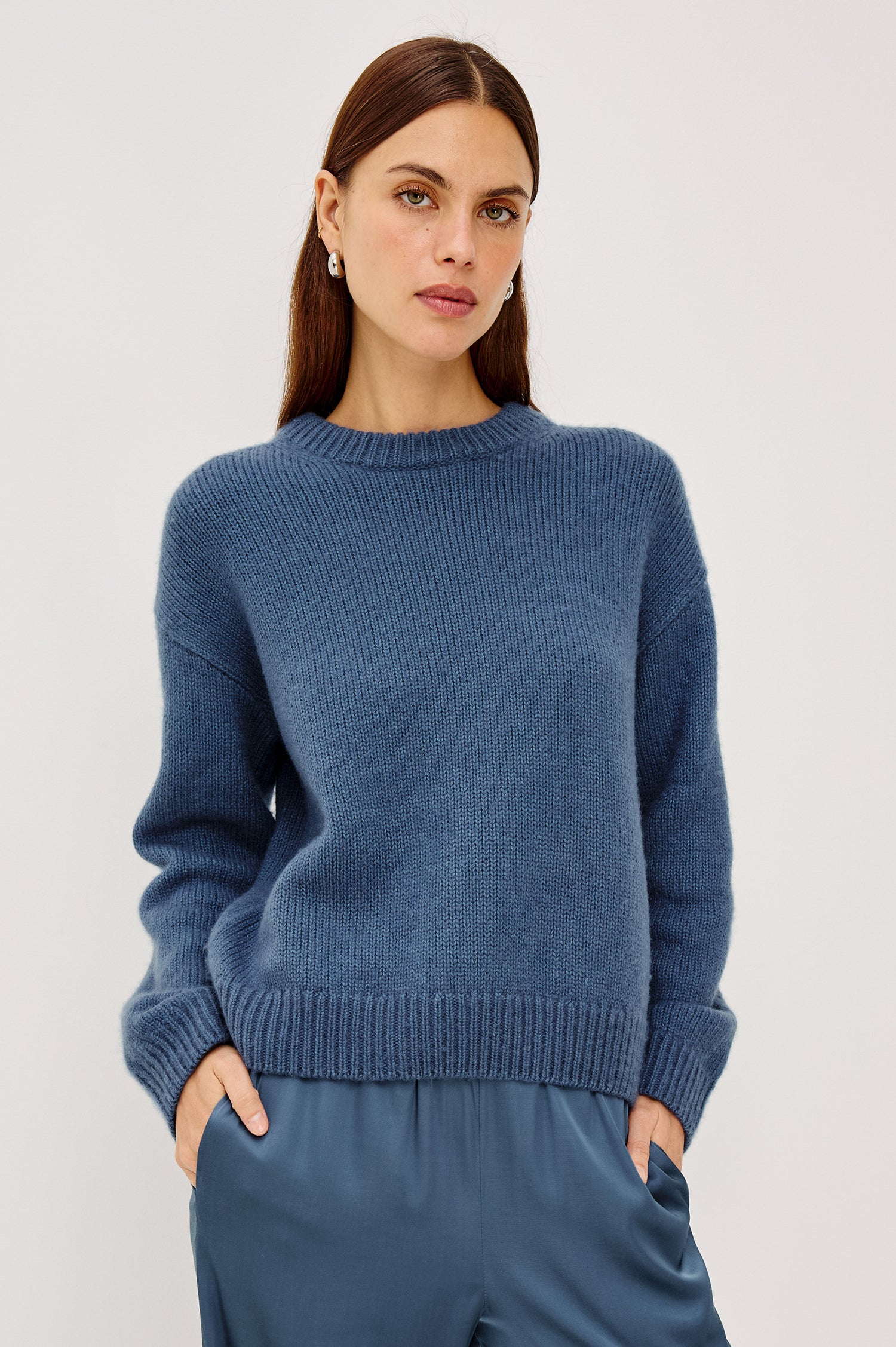 Helly Sweater in Wool-Cashmere Blend With Crew Neckline, Relaxed Boxy Slightly Cropped Fit, Long Sleeves, and Ribbed Trim in Atlantic Colorway - Upper Body Front View Featured on Model