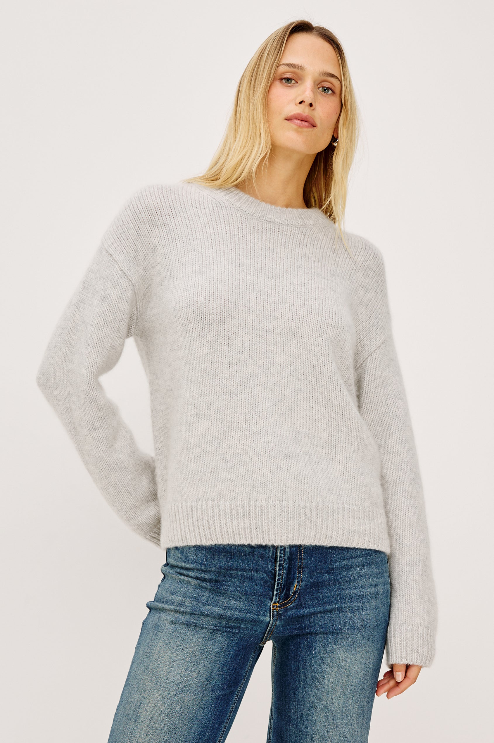 Helly Sweater in Wool-Cashmere Blend With Crew Neckline, Relaxed Boxy Slightly Cropped Fit, Long Sleeves, and Ribbed Trim in Heather Grey Colorway - Upper Body Front View Featured on Model
