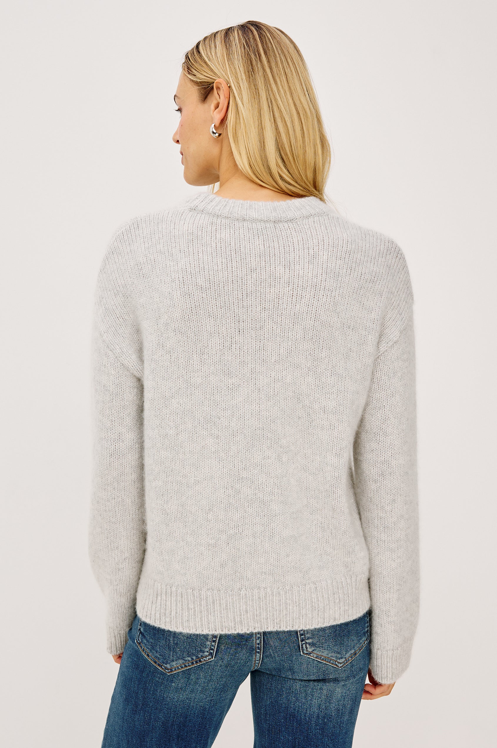 Helly Sweater in Wool-Cashmere Blend With Crew Neckline, Relaxed Boxy Slightly Cropped Fit, Long Sleeves, and Ribbed Trim in Heather Grey Colorway - Upper Body Back View Featured on Model