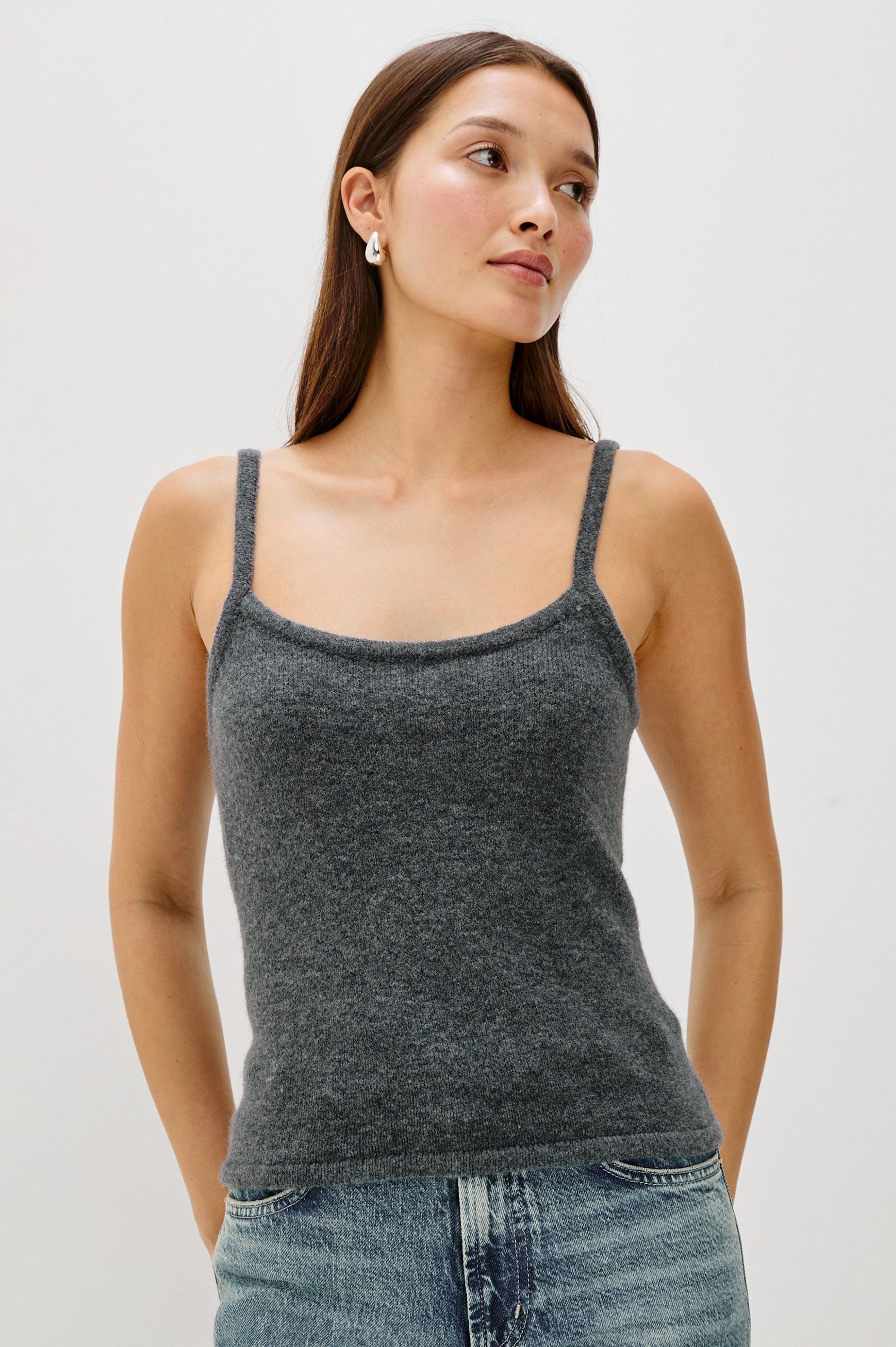 A knitted wool-blend tank top with a simple, classic fit in Charcoal Colorway. Front View featured on Model.