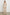 Hollyn Long-Sleeve, V Neck Sweater with a Vertical Seam Down the Front Bodice in Oatmeal Colorway - Front Full Body View Featured on Model 