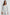 Hollyn Long-Sleeve Sweater with a V Neck and a Seam Down the Front Bodice and Sleeves in Light Heather Grey Colorway- Front View Featured on Model