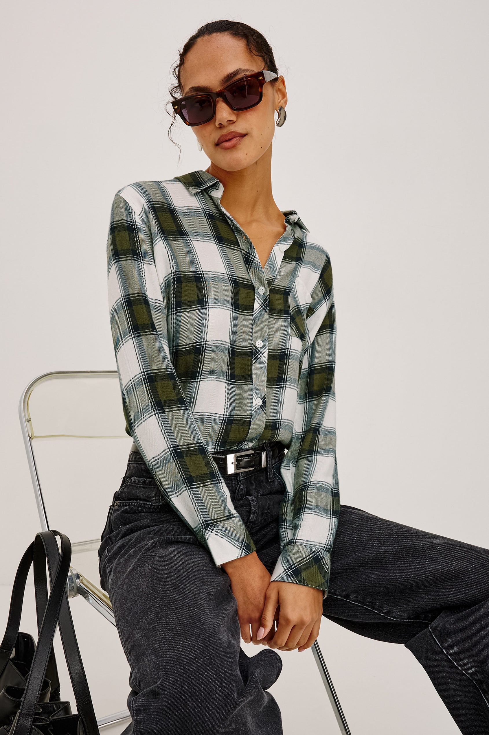 Hunter Button-Up Plaid Shirt in Signature Soft Rayon With Loose Twill Weave, With Collar and Long Sleeves in Olive Ivory Colorway - Upper Body View Featured on Model Sitting