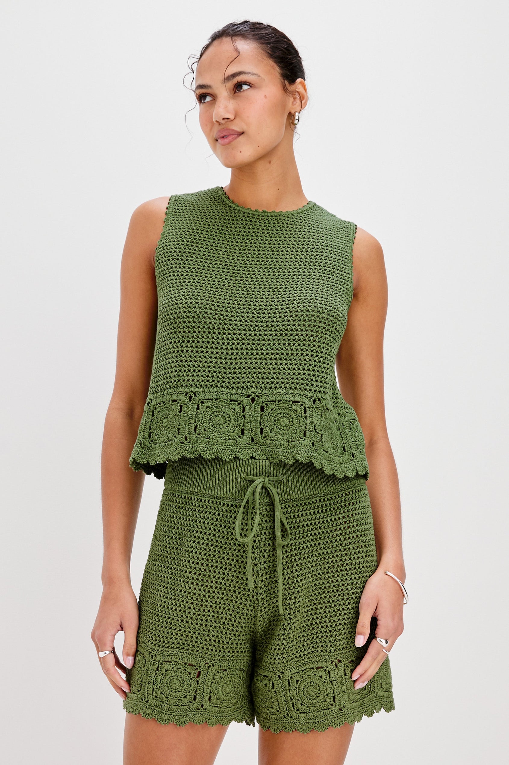 Hydra Short with a Ribbed Drawstring Waistband and Crochet Scalloped Hem in Dill Colorway. Front View Shown on Model.