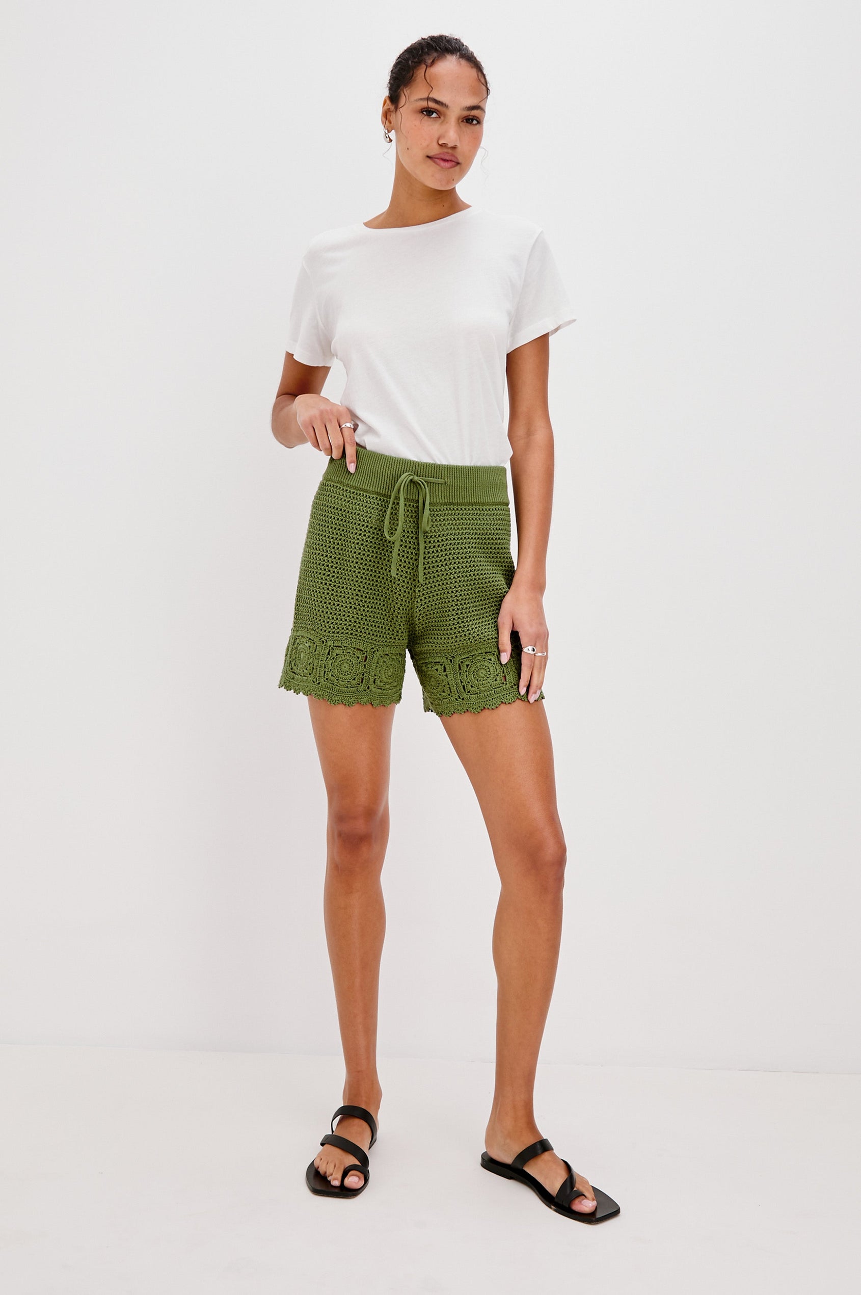 Hydra Short with a Ribbed Drawstring Waistband and Crochet Scalloped Hem in Dill Colorway. Front View Shown on Model.