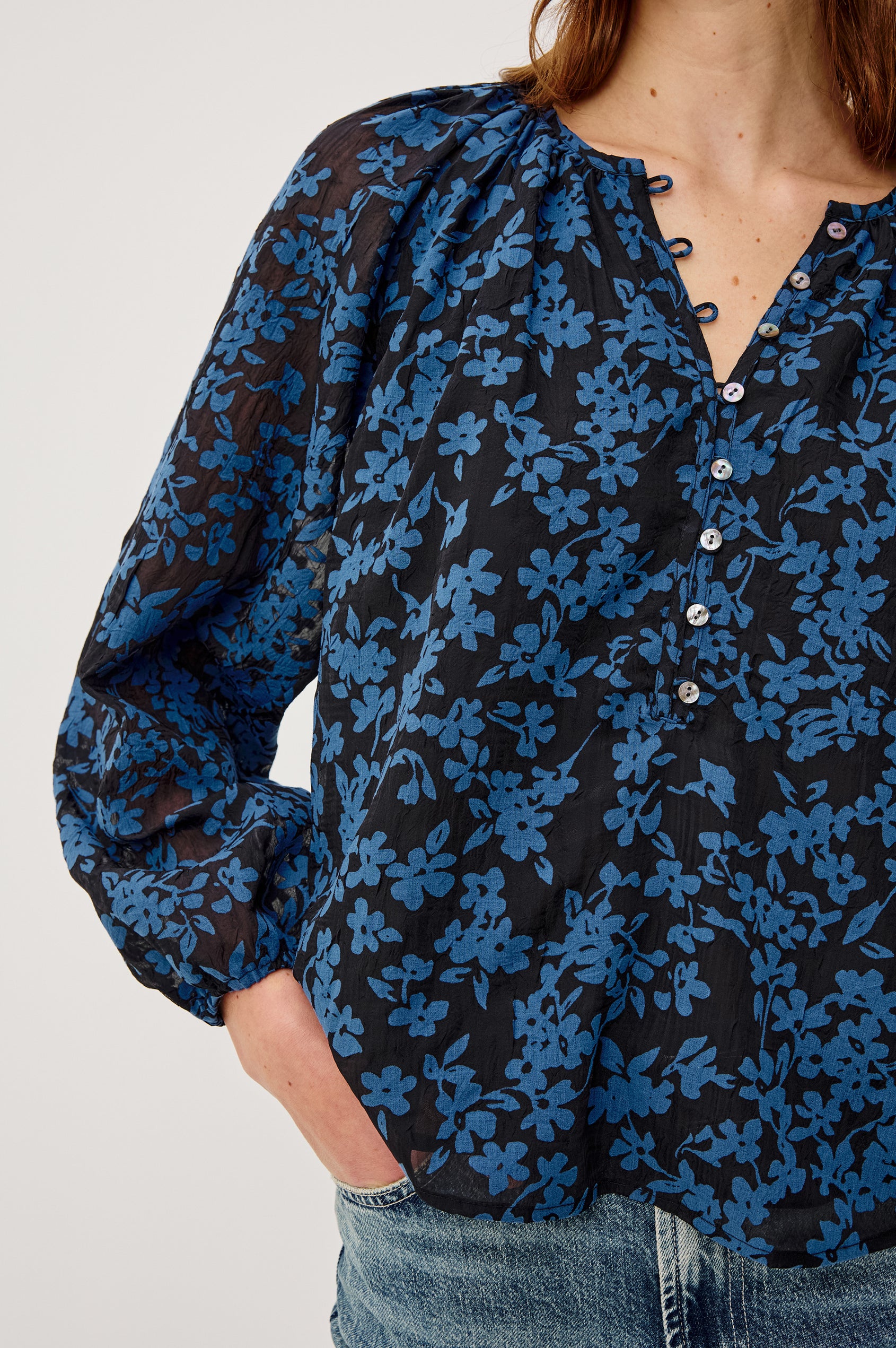 Indi Top in Crinkle Jacquard With Front Button-and-Loop Closures Long Sleeves and Relaxed Fit in Midnight Silhouette Floral Colorway - Upper Body Close Up View Featured on Model
