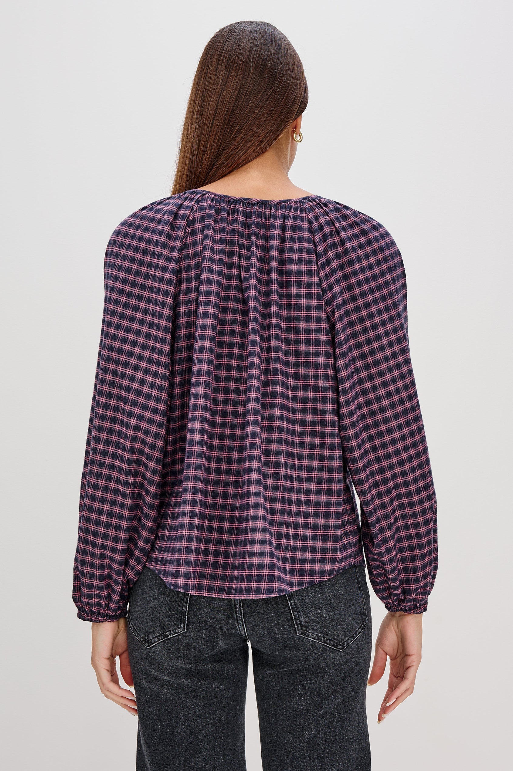 Indi Top with a V Neckline with a Button Placket, Pleating at Back Neckline and Elastic Cuffs in Rose Check Colorway - Back View Featured on Model