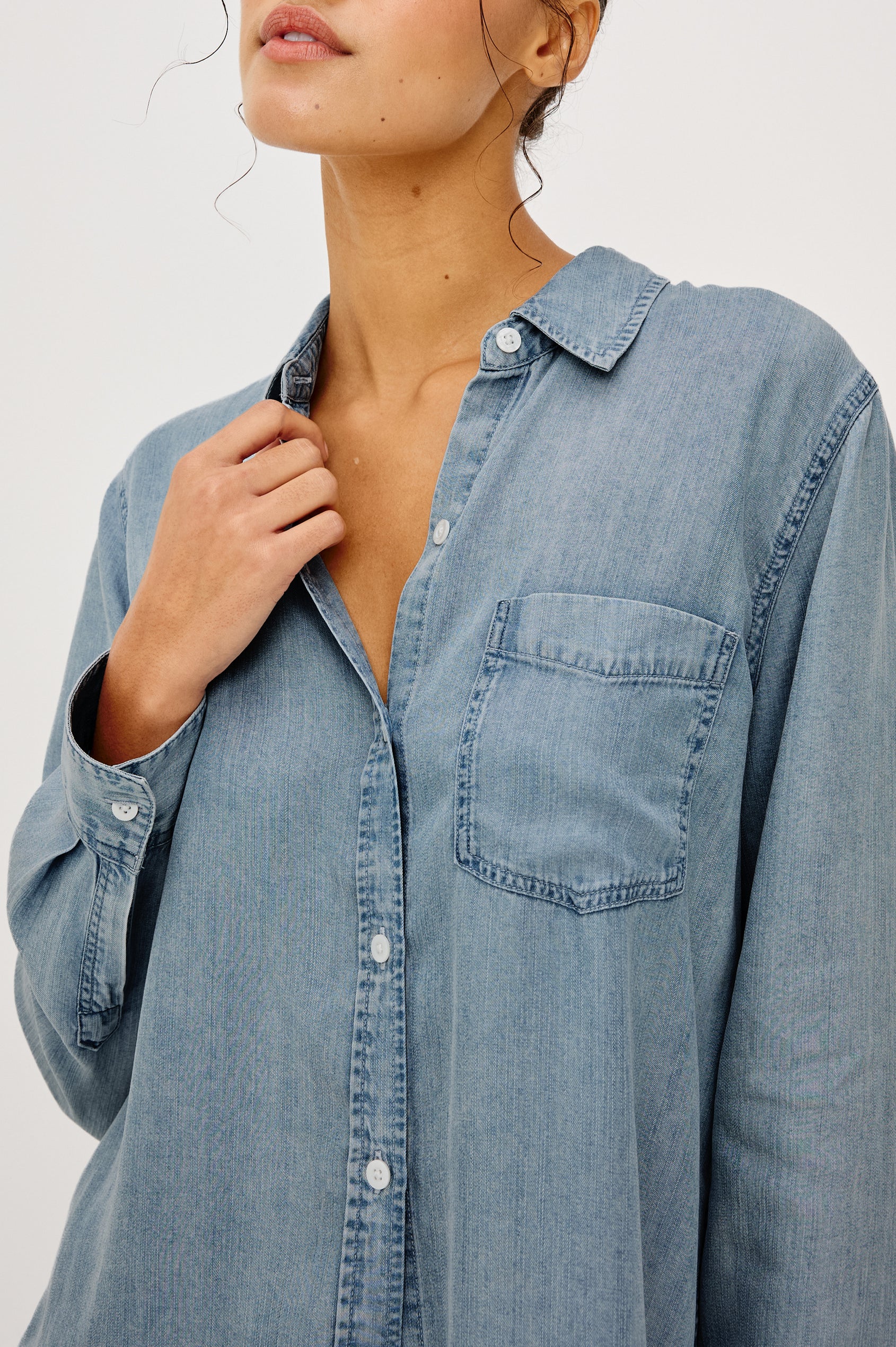 Ingrid Button-Up Collared Shirt in TENCEL™Denim With Vintage-Inspired Wash, Chest Patch Pocket, and Long Sleeves in Cloud Wash Colorway - Upper Body Front View Featured on Model