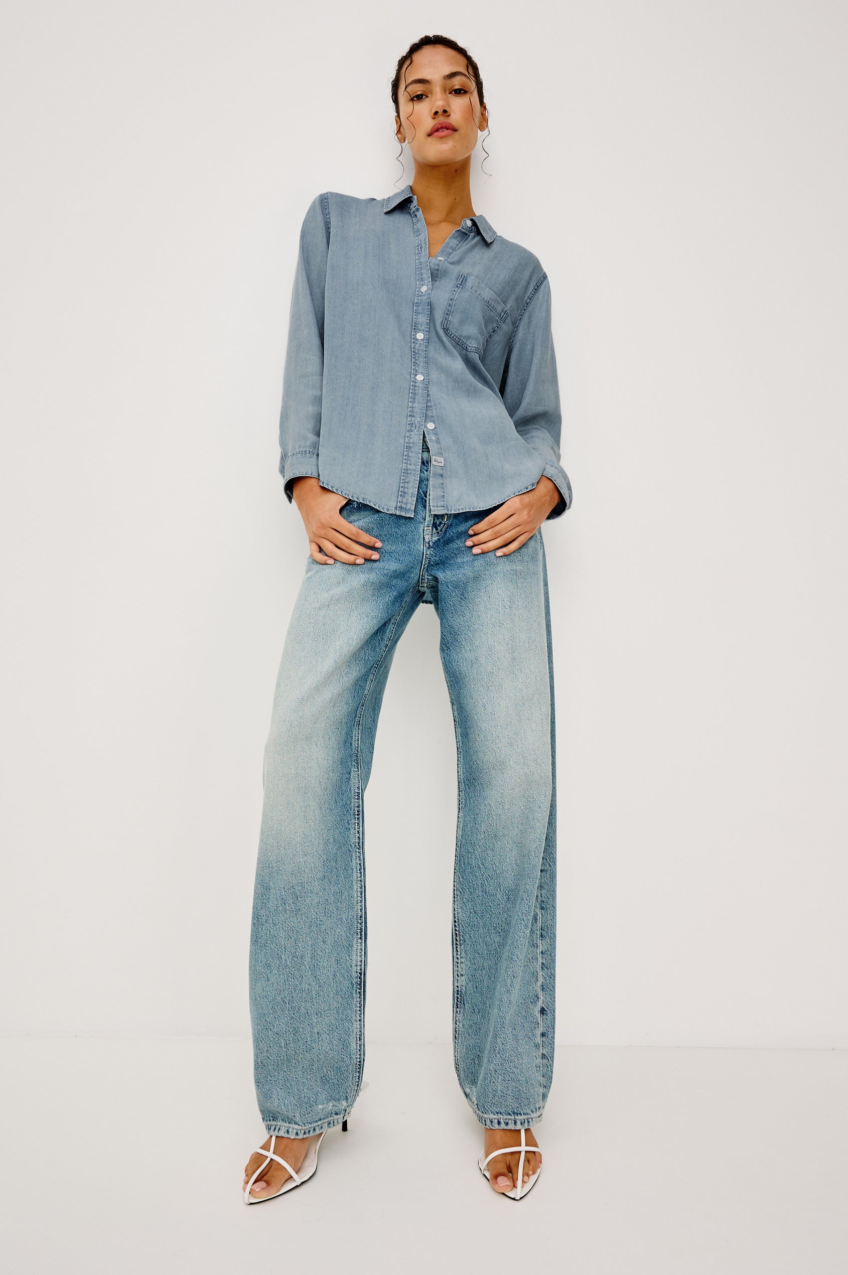 Ingrid Button-Up Collared Shirt in TENCEL™Denim With Vintage-Inspired Wash, Chest Patch Pocket, and Long Sleeves in Cloud Wash Colorway - Full Body Front View Featured on Model