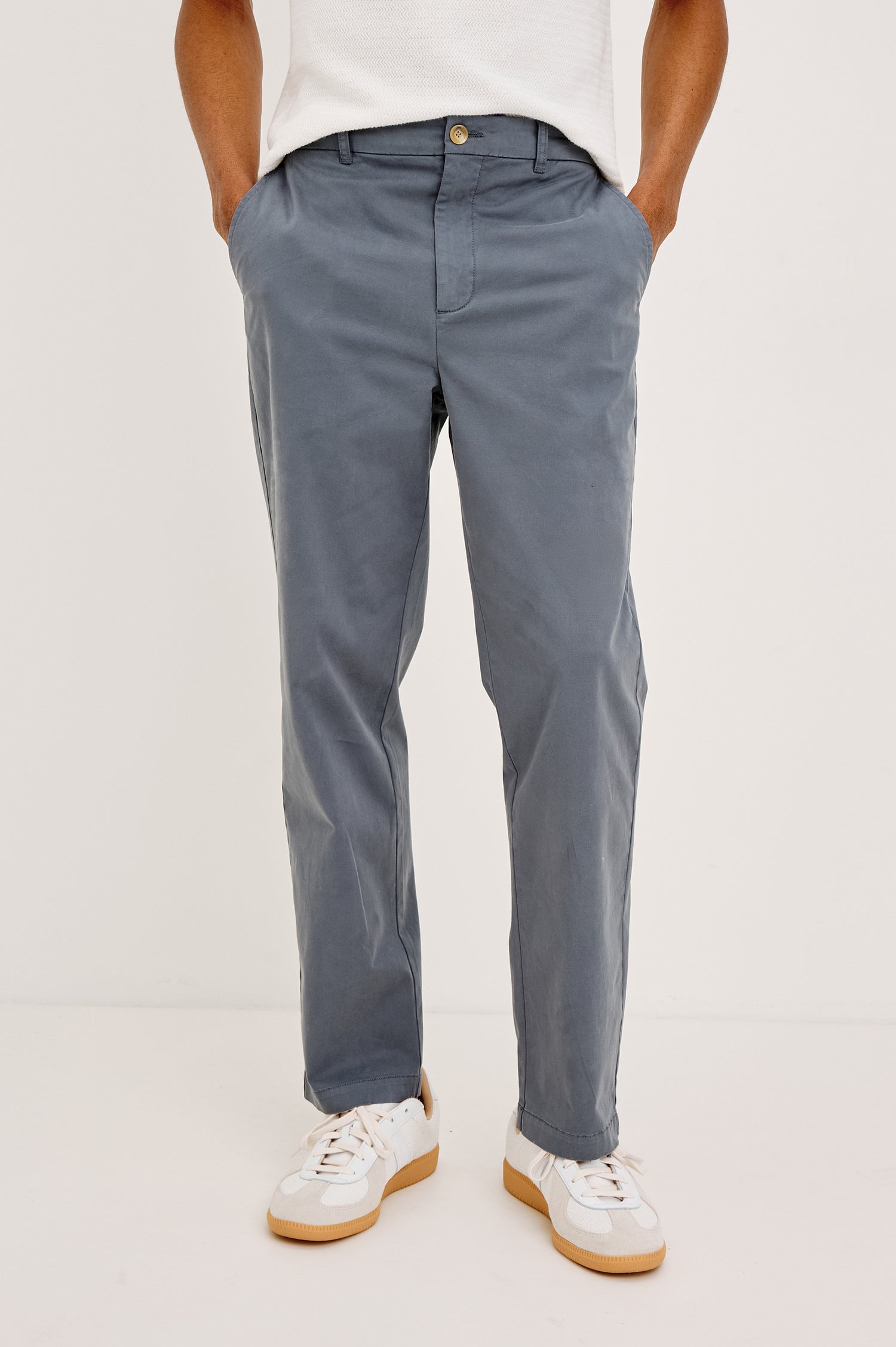Irving Slim Straight Pant With Side Slant Pockets and Back Welt Pockets in Ensign Blue Colorway - Lower Body Front View Featured on Model