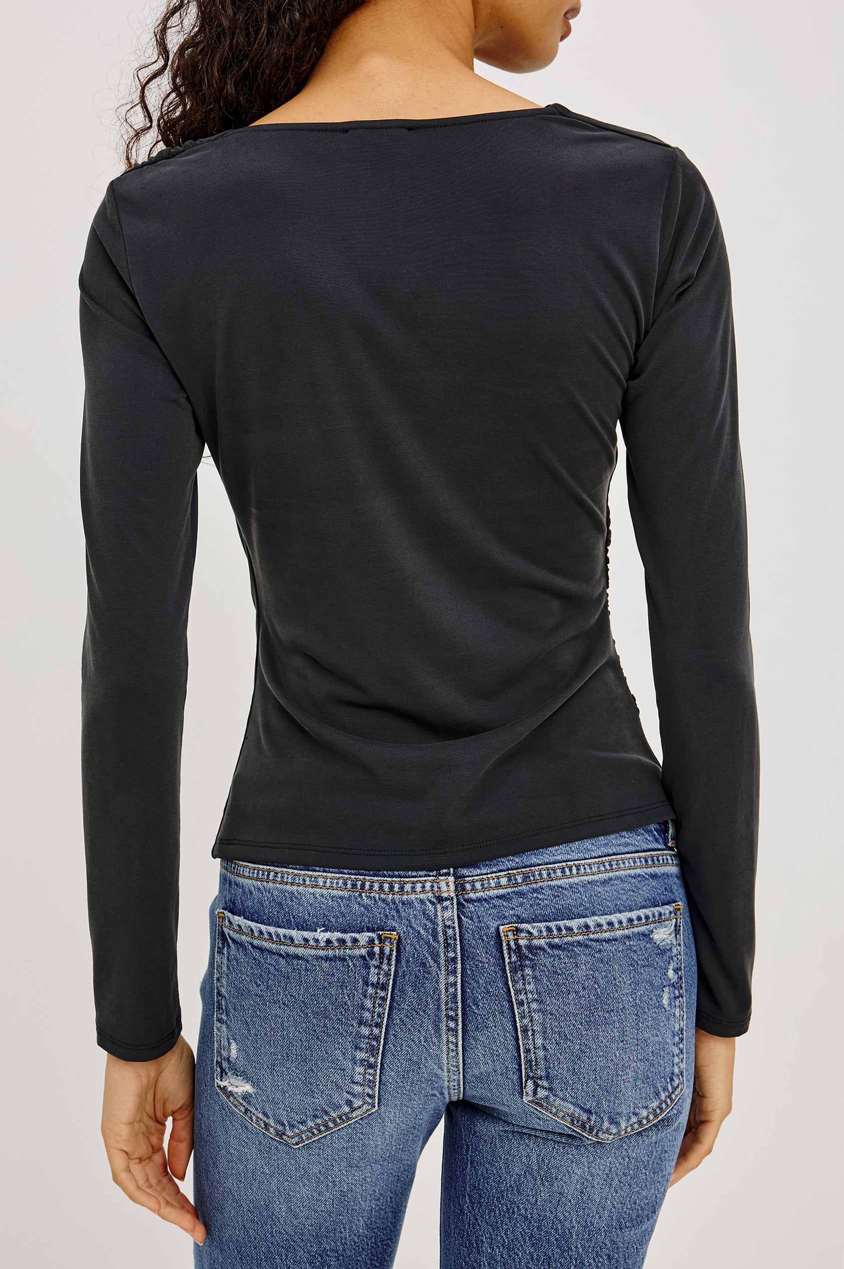 Issel Top in Soft Jersey With Cowl Neckline, Ruched Waist, and Form-Fitting Silhouette in Ash Colorway - Upper Body Back View Featured on Model