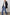 Jac Double-Breasted Blazer with Two Front Flap Pockets and a Notched Label in Black Twill Colorway - Front Full Body View Featured on Model