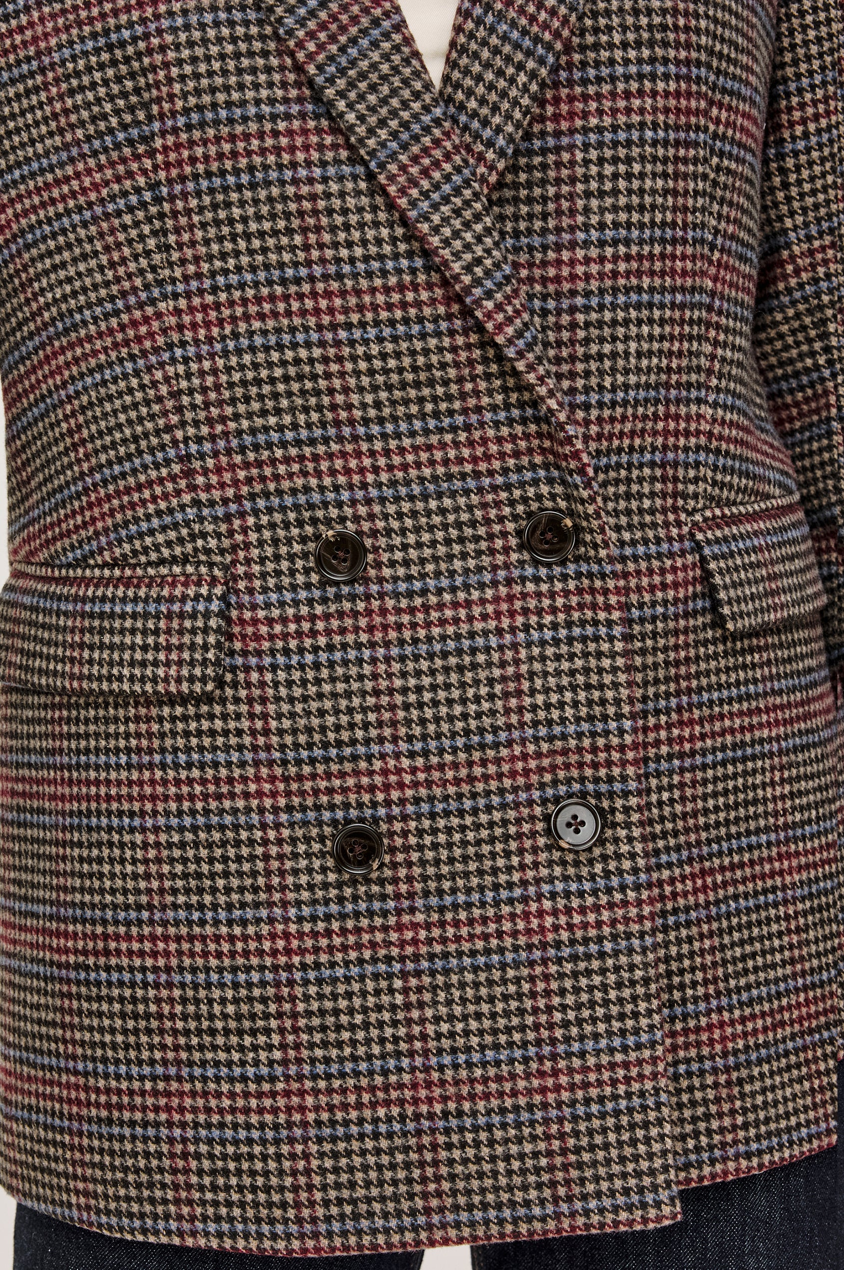 Jac Blazer in Wool Blend With Double-Breasted Design, Notched Lapels, Long Sleeves, Side Flap Pockets, and Fully Lined in Oxford Plum Colorway - Mid Body Front Close Up View Featured on Model