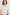 Janis short-sleeve cotton t-shirt with a sweetheart neckline and gathered, shirred detailing at the chest in White Colorway - front detailed view featured on model with shirt tucked in and styled with a western belt.