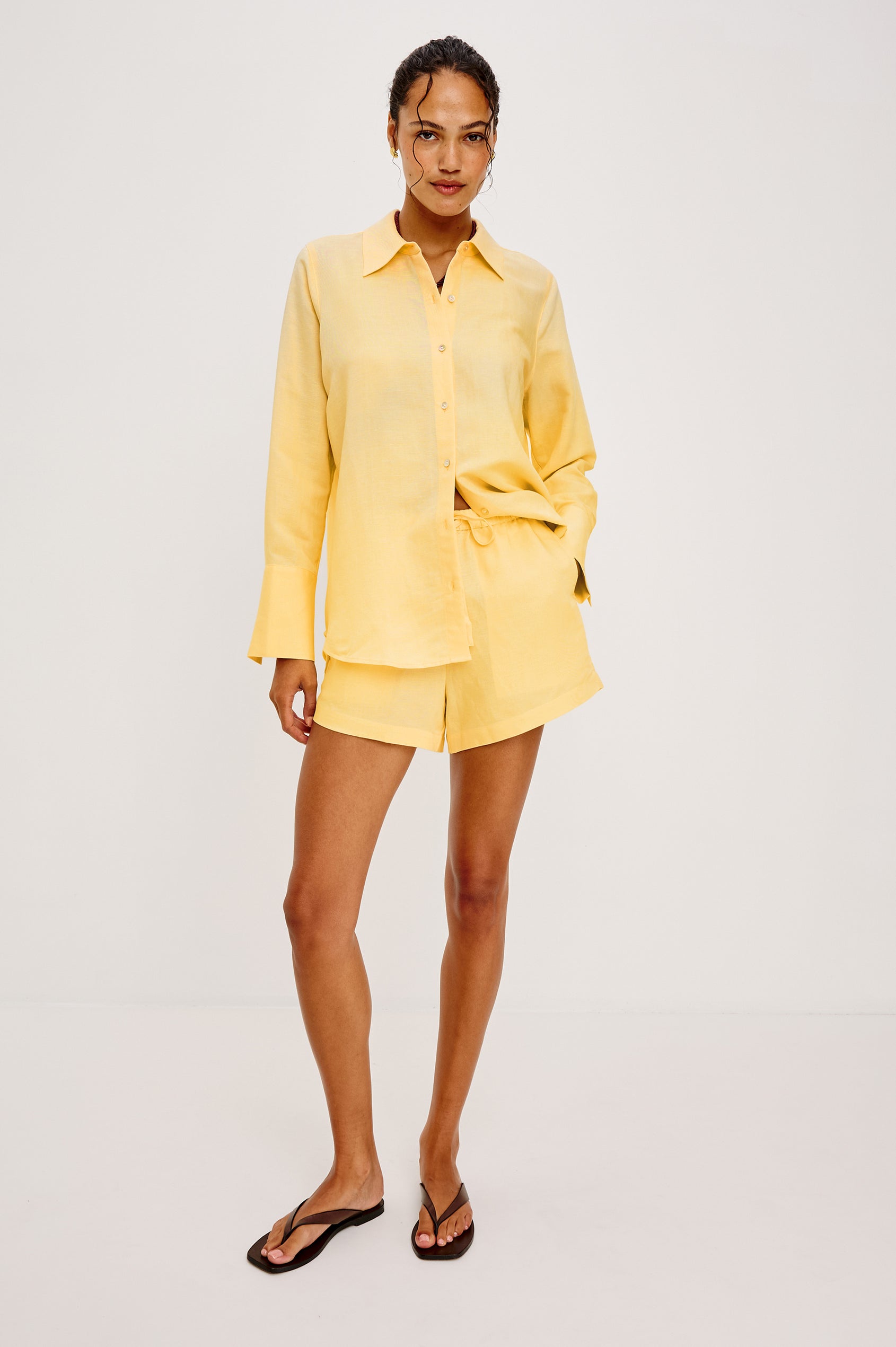 Jenner High-Waisted Short in Unlined Linen With Adjustable Drawstring Waist TIes, Side Pockets, and Relaxed Fit in Sunshine Colorway - Full Body Front View Featured on Model