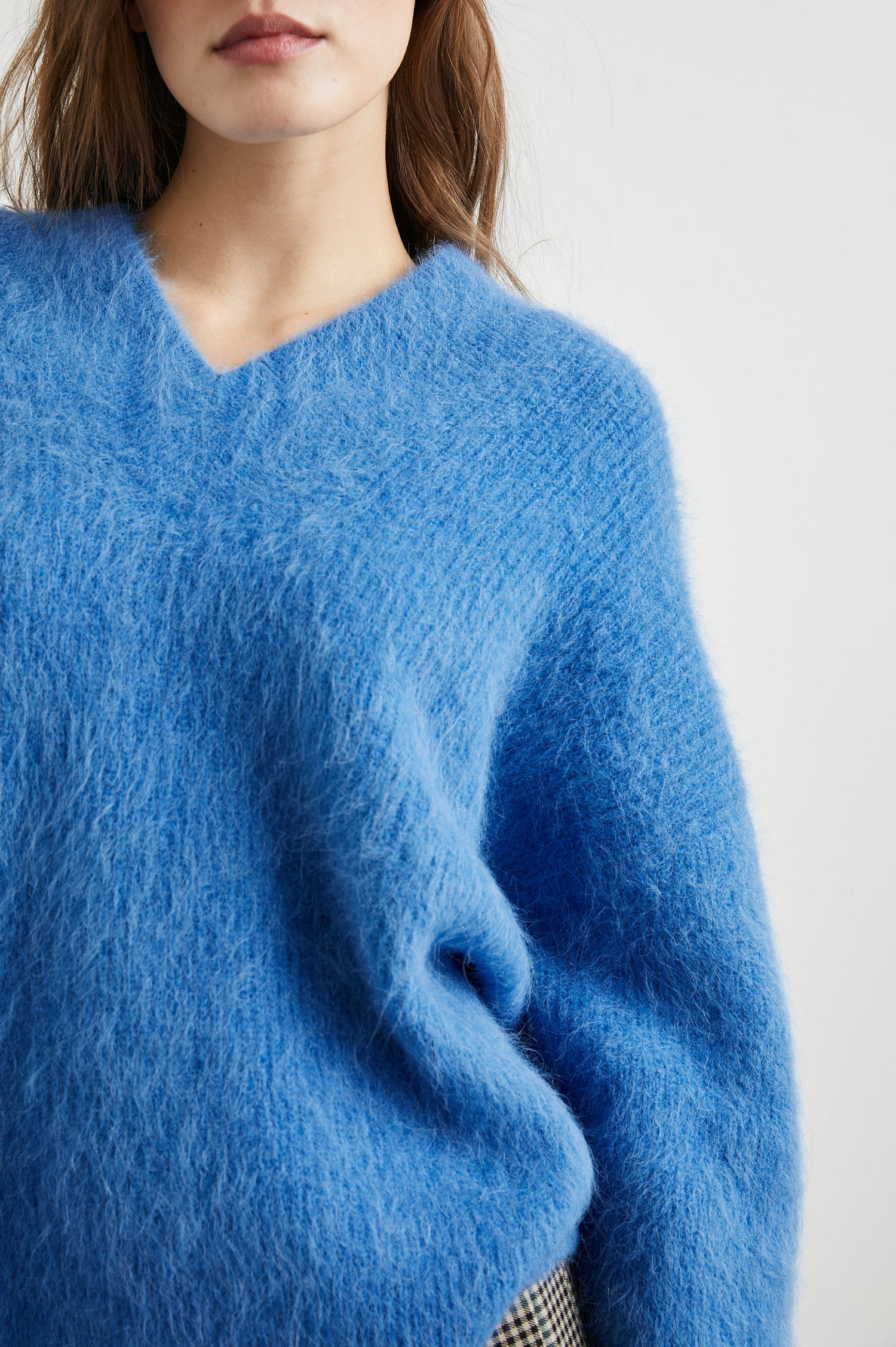 Jodie Long-Sleeve Sweater with a V Neck in Cobalt Colorway  - Front View Featured on Model