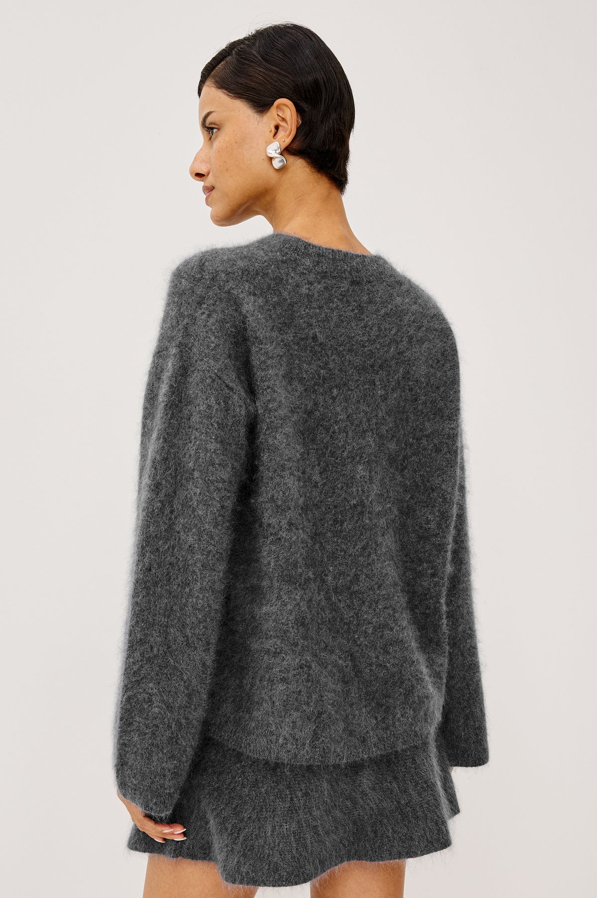 Joel Sweater in Brushed Wool With Oversized Boxy Relaxed Fit, Drop Shoulders, and Mock Neckline in Charcoal Colorway - Upper Body Back View Featured on Model