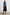 Joelle Long Sleeve Top with An Asymmetrical Mock Neck and Shirring on the Right Shoulder in Midnight Lily Colorway, with blue Lilies on Midnight - Front Full Body View Featured on Model